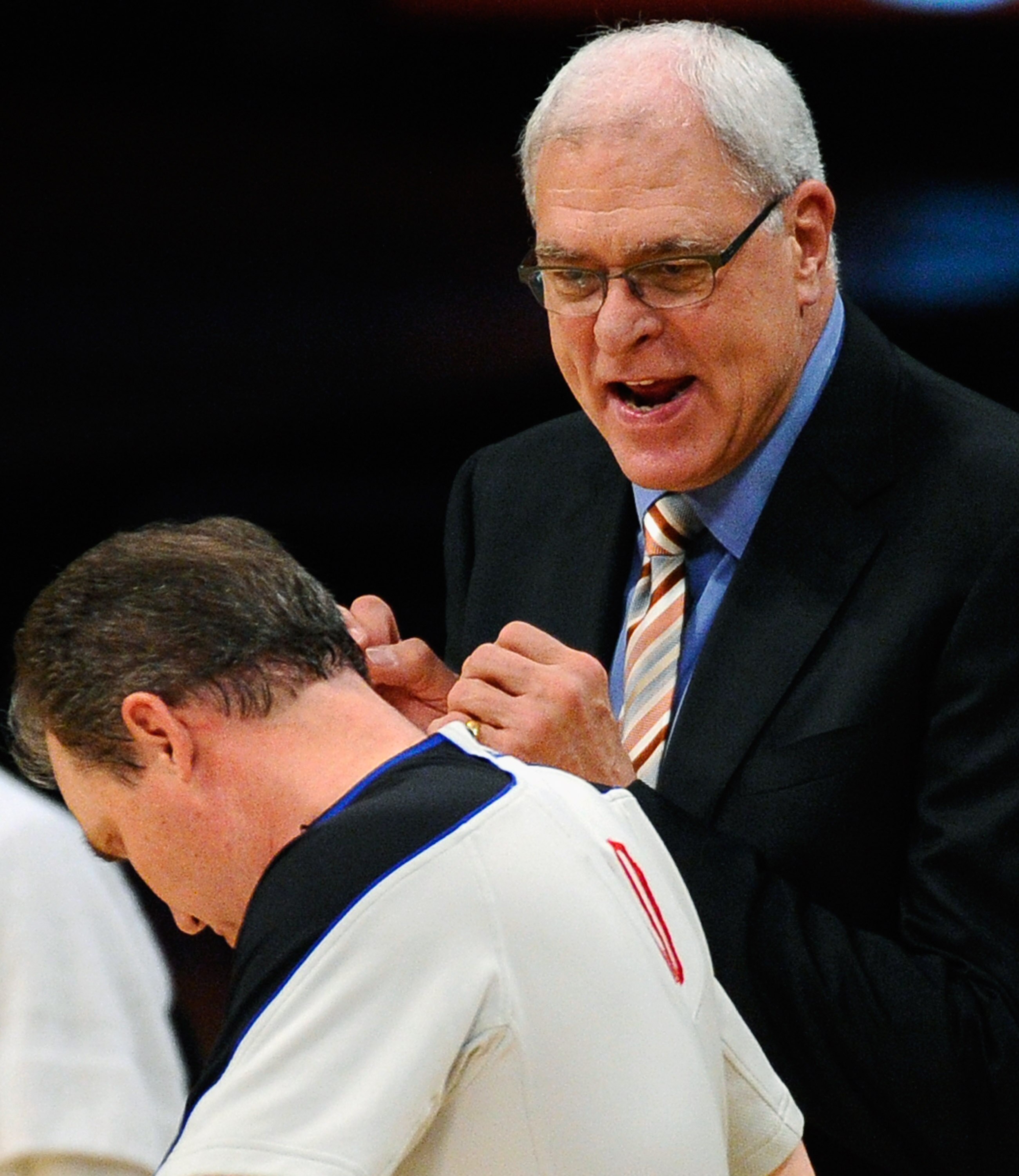 LOS ANGELES, CA - APRIL 03:  Coach Phil Jackson of the Los Angeles Lakers argues a call by referee Ron Garretson during the game against Denver Nuggets at Staples Center on April 3, 2011 in Los Angeles, California. NOTE TO USER: User expressly acknowledge