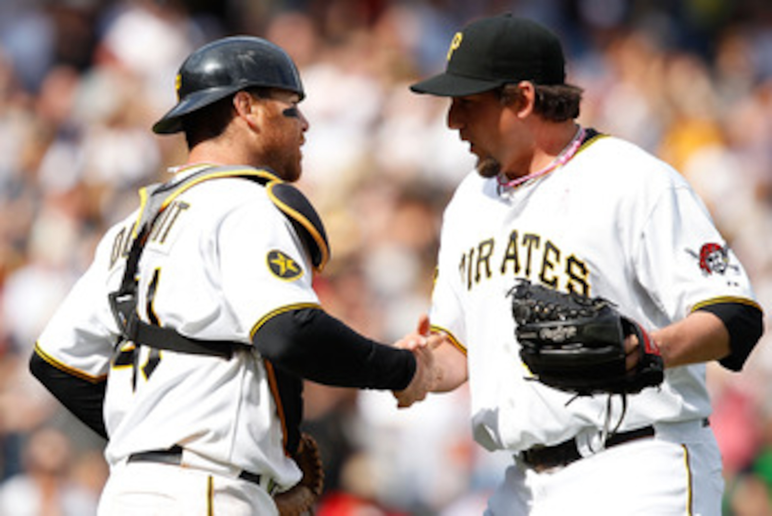 PITTSBURGH - MAY 08: Joel Hanrahan #52 of the Pittsburgh Pirates celebrates with teammate Ryan Doumit #41 after their win against the Houston Astros during the game on May 8, 2011 at PNC Park in Pittsburgh, Pennsylvania. (Photo by Jared Wickerham/Getty PITTSBURGH - MAY 08: Joel Hanrahan #52 of the Pittsburgh Pirates celebrates with teammate Ryan Doumit #41 after their win against the Houston Astros during the game on May 8, 2011 at PNC Park in Pittsburgh, Pennsylvania. (Photo by Jared Wickerham/Getty