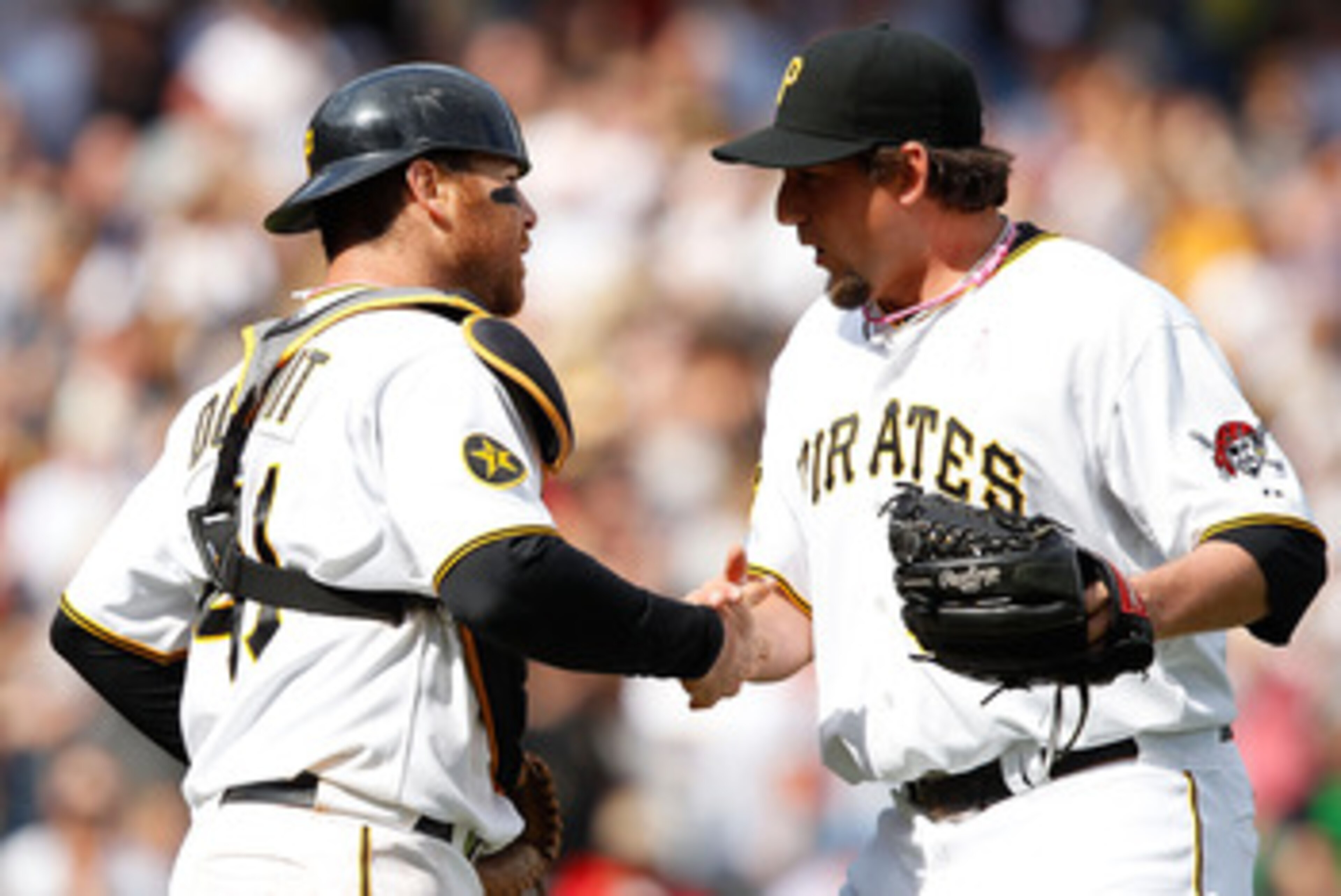 PITTSBURGH - MAY 08:  Joel Hanrahan #52 of the Pittsburgh Pirates celebrates with teammate Ryan Doumit #41 after their win against the Houston Astros during the game on May 8, 2011 at PNC Park in Pittsburgh, Pennsylvania.  (Photo by Jared Wickerham/Getty 