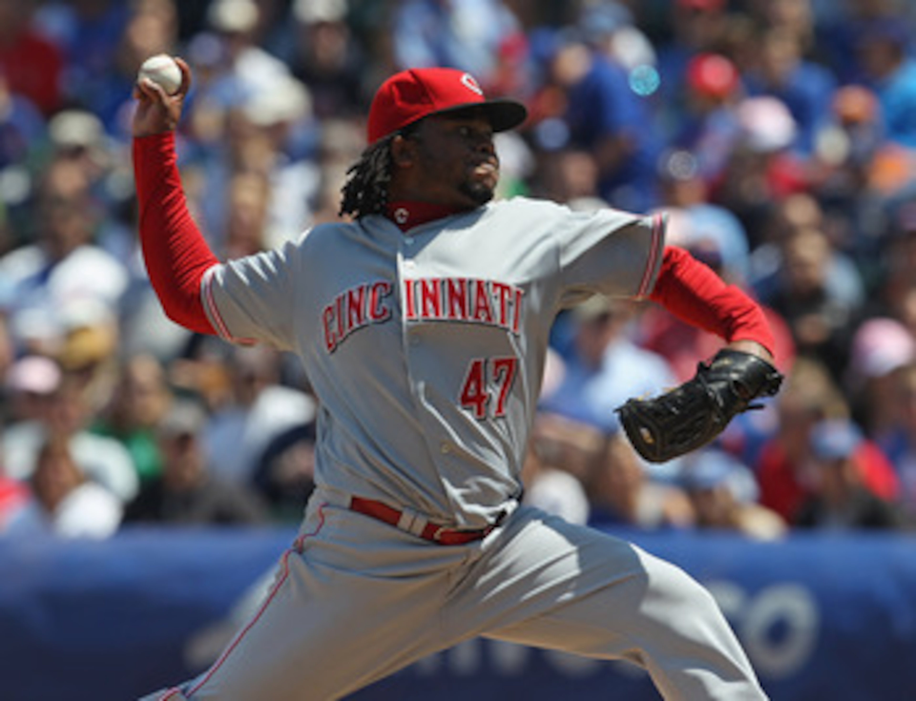 CHICAGO, IL - MAY 08: Starting pitcher Johnny Cueto #47 of the Cincinnati Reds delivers the ball against the Chicago Cubs at Wrigley Field on May 8, 2011 in Chicago, Illinois. (Photo by Jonathan Daniel/Getty Images)