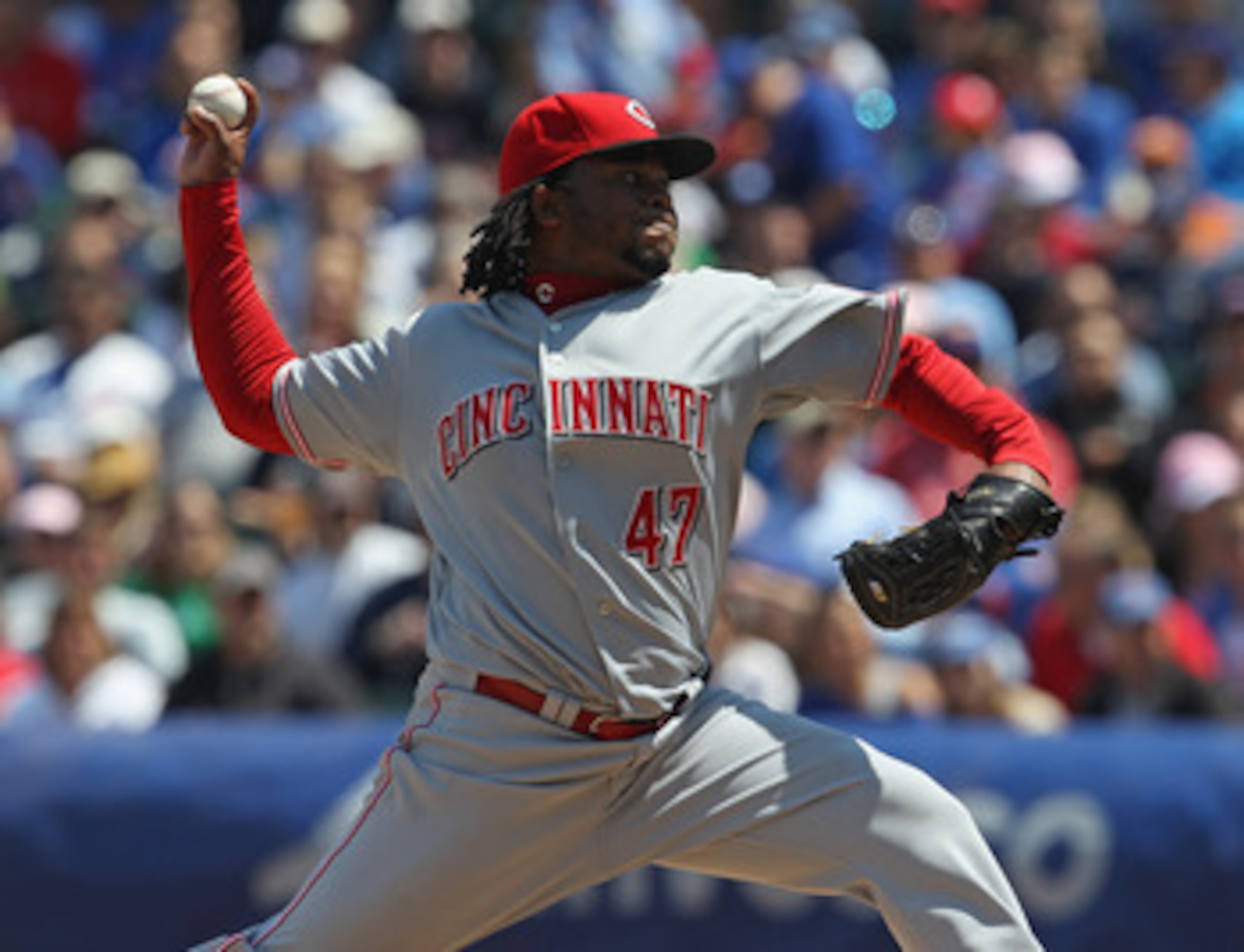 CHICAGO, IL - MAY 08: Starting pitcher Johnny Cueto #47 of the Cincinnati Reds delivers the ball against the Chicago Cubs at Wrigley Field on May 8, 2011 in Chicago, Illinois. (Photo by Jonathan Daniel/Getty Images)