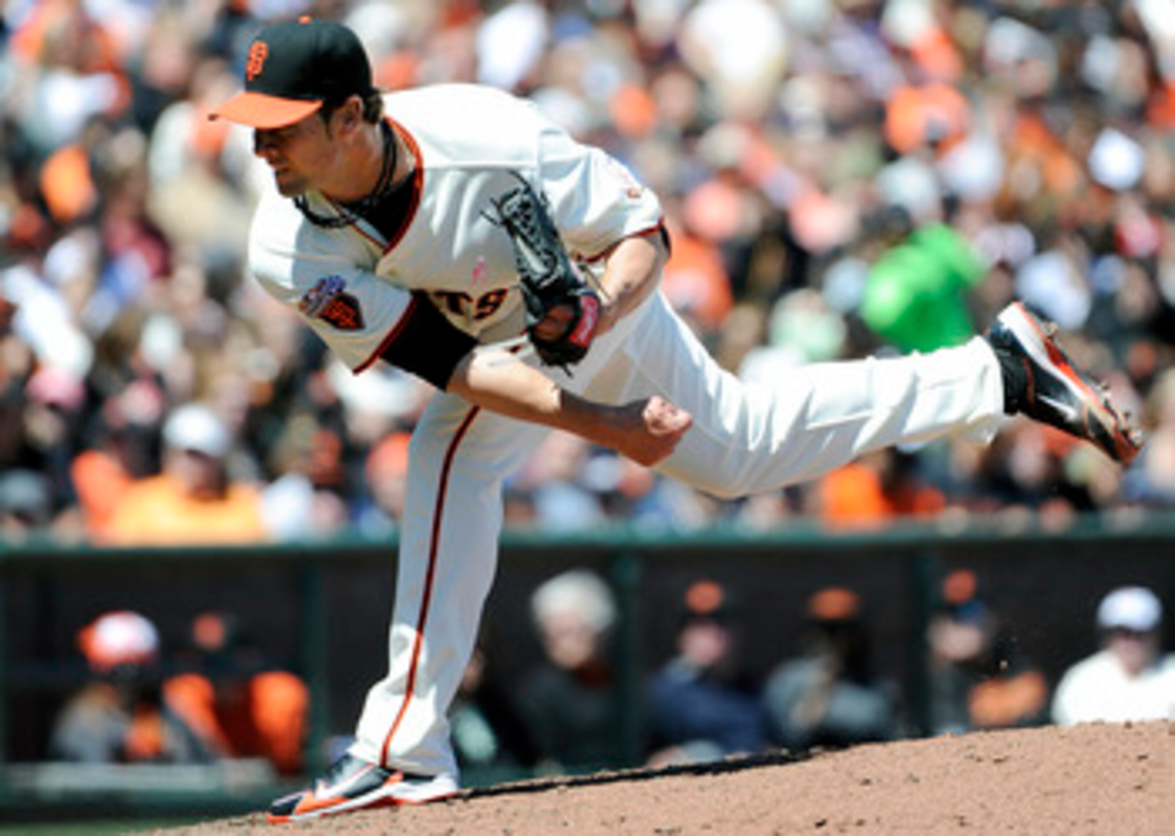 SAN FRANCISCO, CA - MAY 8: Ryan Vogelsong #32 of the San Francisco Giants pitches against Colorado Rockies during a MLB baseball game at AT&T Park May 8, 2011 in San Francisco, California.  The Giants won the game 3-1. (Photo by Thearon W. Henderson/Getty