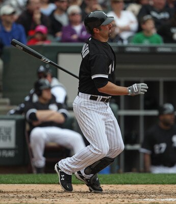 CHICAGO, IL - MAY 01: Paul Konerko #14 of the Chicago White Sox hits the ball against the Baltimore Orioles at U.S. Cellular Field on May 1, 2011 in Chicago, Illinois. The Orioles defeated the White Sox 6-4. (Photo by Jonathan Daniel/Getty Images)