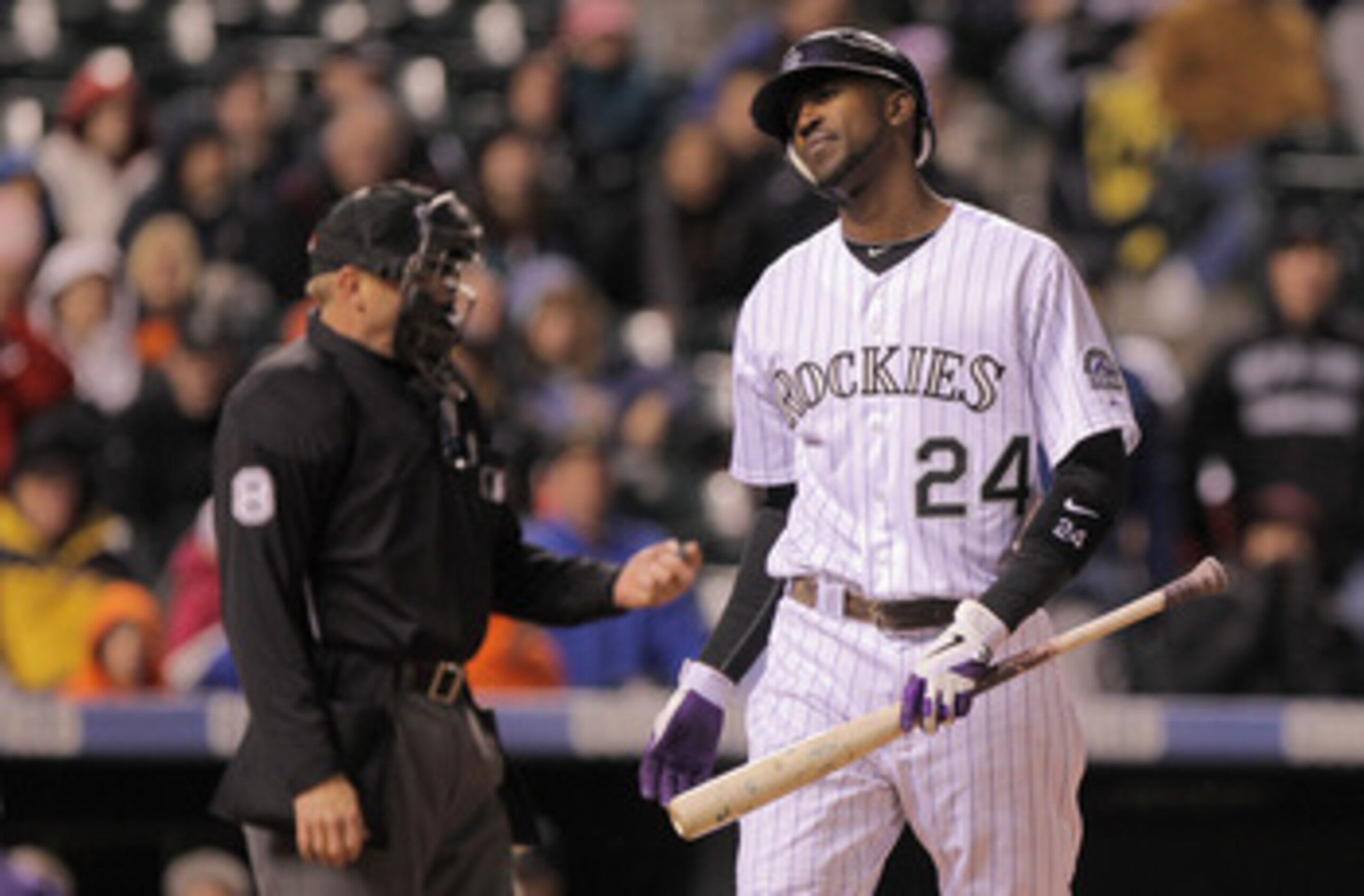 DENVER, CO - APRIL 29:  Dexter Fowler #24 of the Colorado Rockies reacts after striking out in the eighth inning against pitcher Chris Resop of the Pittsburgh Pirates at Coors Field on April 29, 2011 in Denver, Colorado. The Pirates defeated the Rockies 3