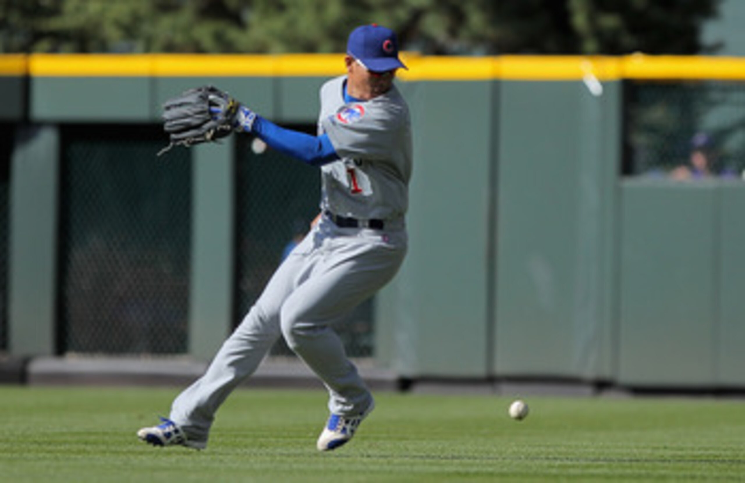 DENVER, CO - APRIL 17:  Rightfielder Kosuke Fukudome #1 of the Chicago Cubs misplays a ball agaisnt the Colorado Rockies at Coors Field on April 17, 2011 in Denver, Colorado.  (Photo by Doug Pensinger/Getty Images)