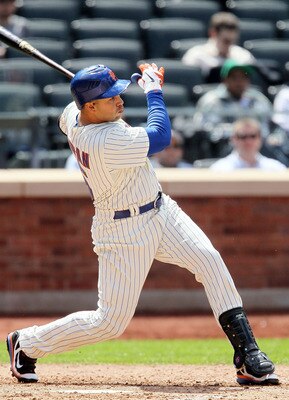 NEW YORK, NY - MAY 05:  Carlos Beltran #15 of the New York Mets follows through on a fifth inning two run home run against the San Francisco Giants on May 5, 2011 at Citi Field in the Flushing neighborhood of the Queens borough of New York City.  (Photo b