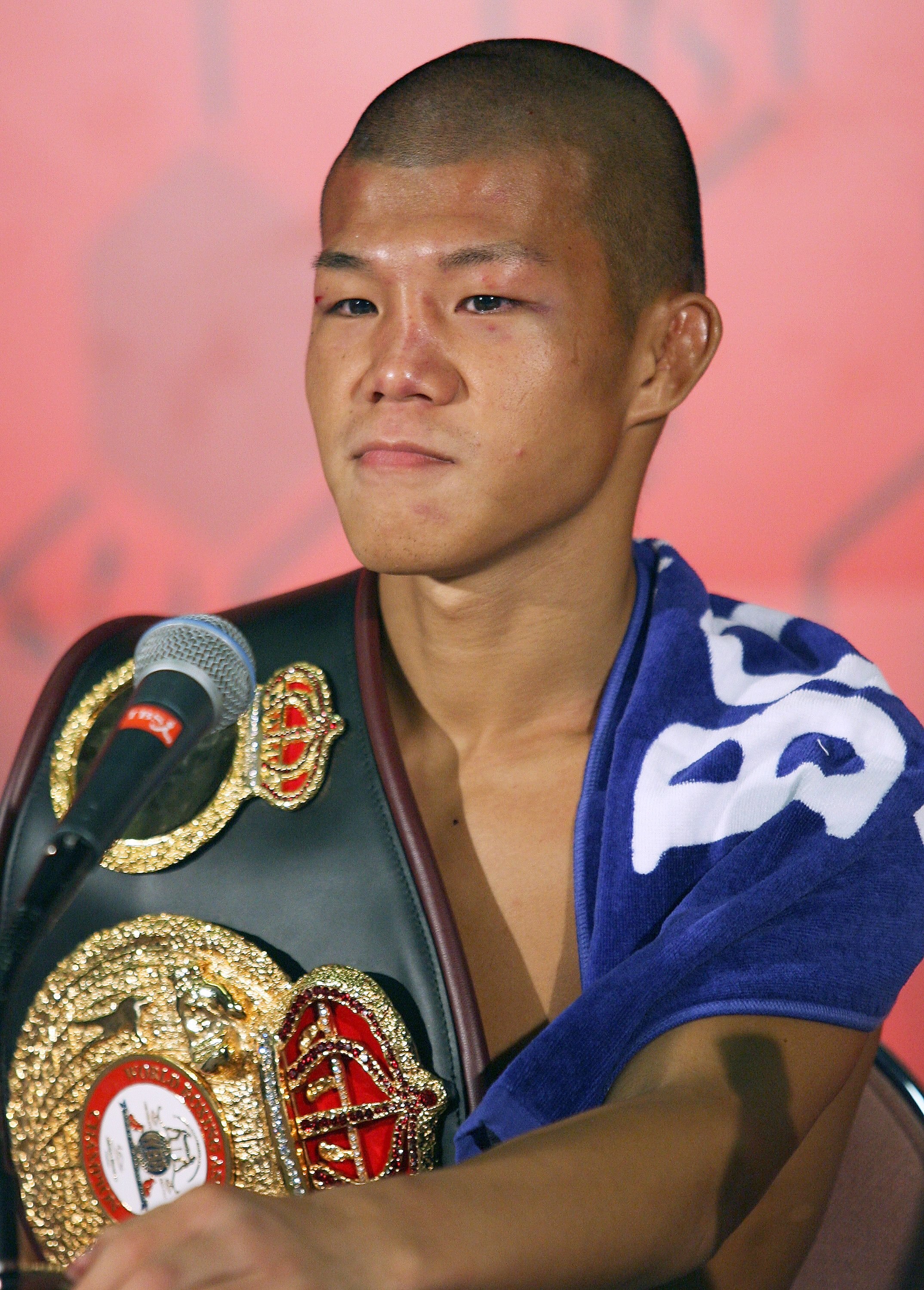 YOKOHAMA, JAPAN - AUGUST 2:  New champion Koki Kameda of Japan attends a press conference after defeating Juan Jose Landaeta of Venezuela in the World Boxing Association light flyweight title bout at Yokohama Arena on August 2, 2006 in Yokohama, Japan.  (