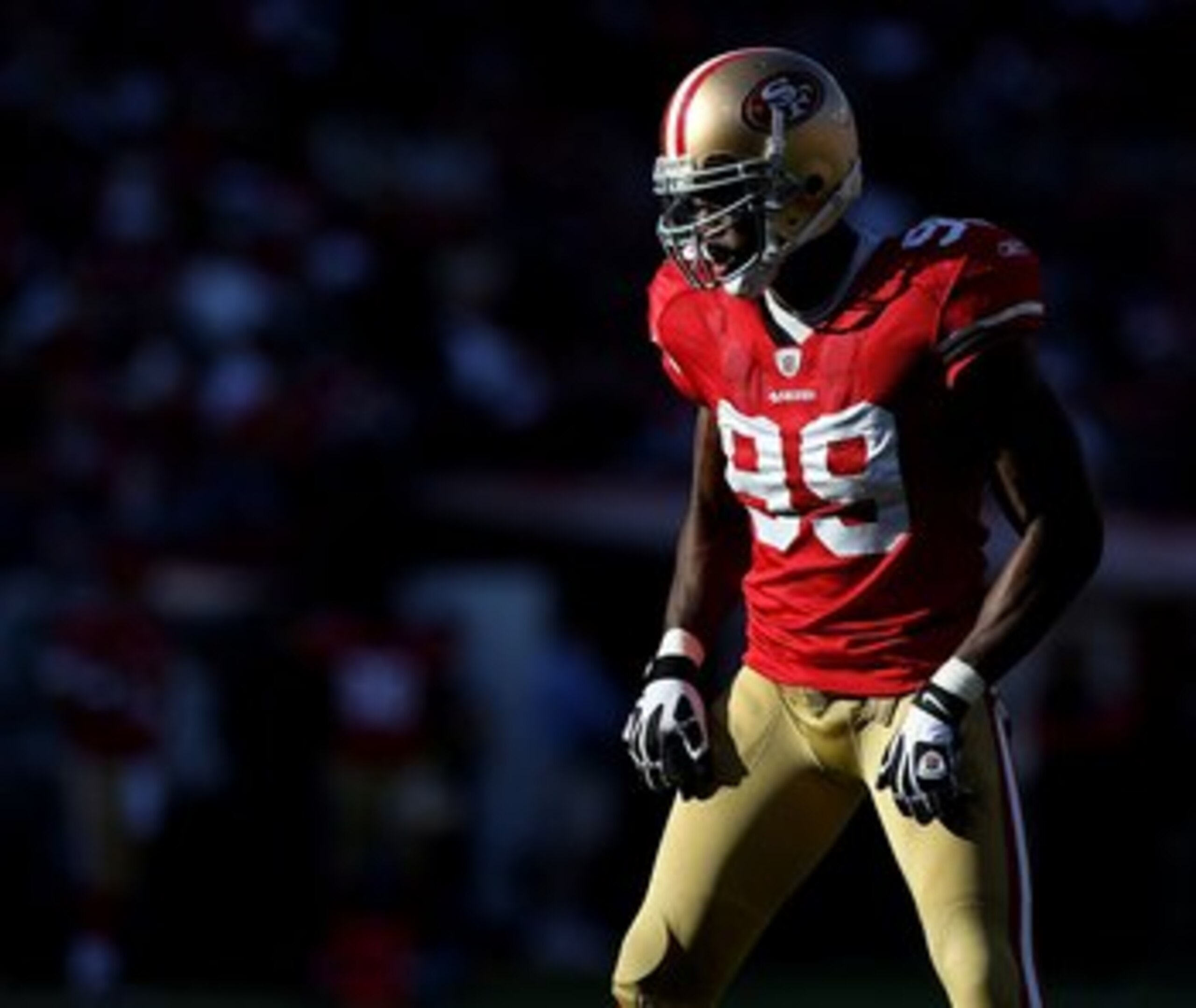 SAN FRANCISCO - NOVEMBER 08:  Manny Lawson #99 of the San Francisco 49ers looks on against the Tennessee Titans during an NFL game on November 8, 2009 at Candlestick Park in San Francisco, California.  (Photo by Jed Jacobsohn/Getty Images)