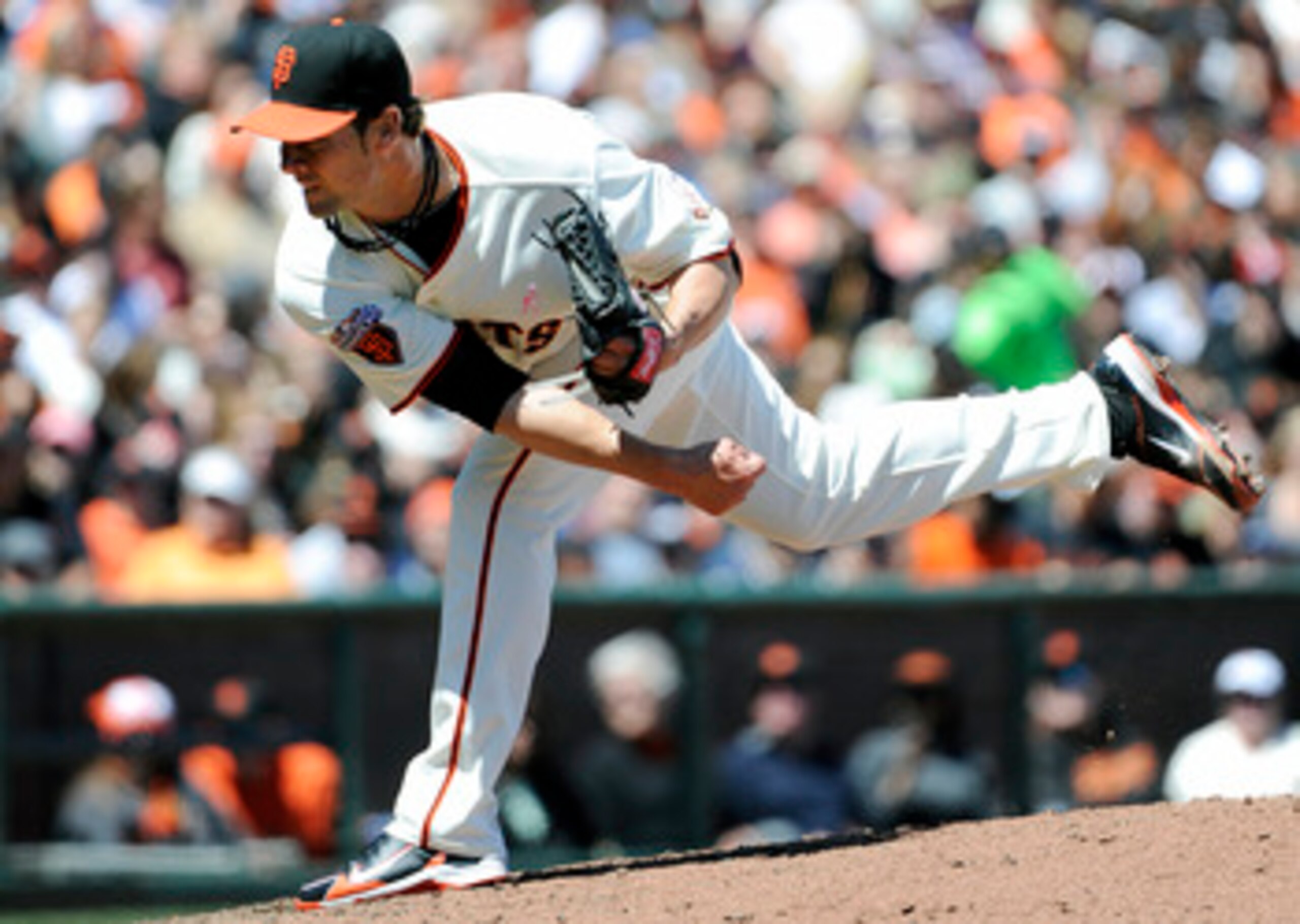 SAN FRANCISCO, CA - MAY 8: Ryan Vogelsong #32 of the San Francisco Giants pitches against Colorado Rockies during a MLB baseball game at AT&T Park May 8, 2011 in San Francisco, California.  The Giants won the game 3-1. (Photo by Thearon W. Henderson/Getty
