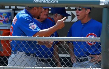 CHICAGO - JUNE 25: Starting pitcher Carlos Zambrano #38 of the Chicago Cubs (L) yells at manager Lou Pinella #41 (center) and bench coach Alan Trammell #3 after giving up four runs in the 1st inning to the Chicago White Sox at U.S. Cellular Field on June 