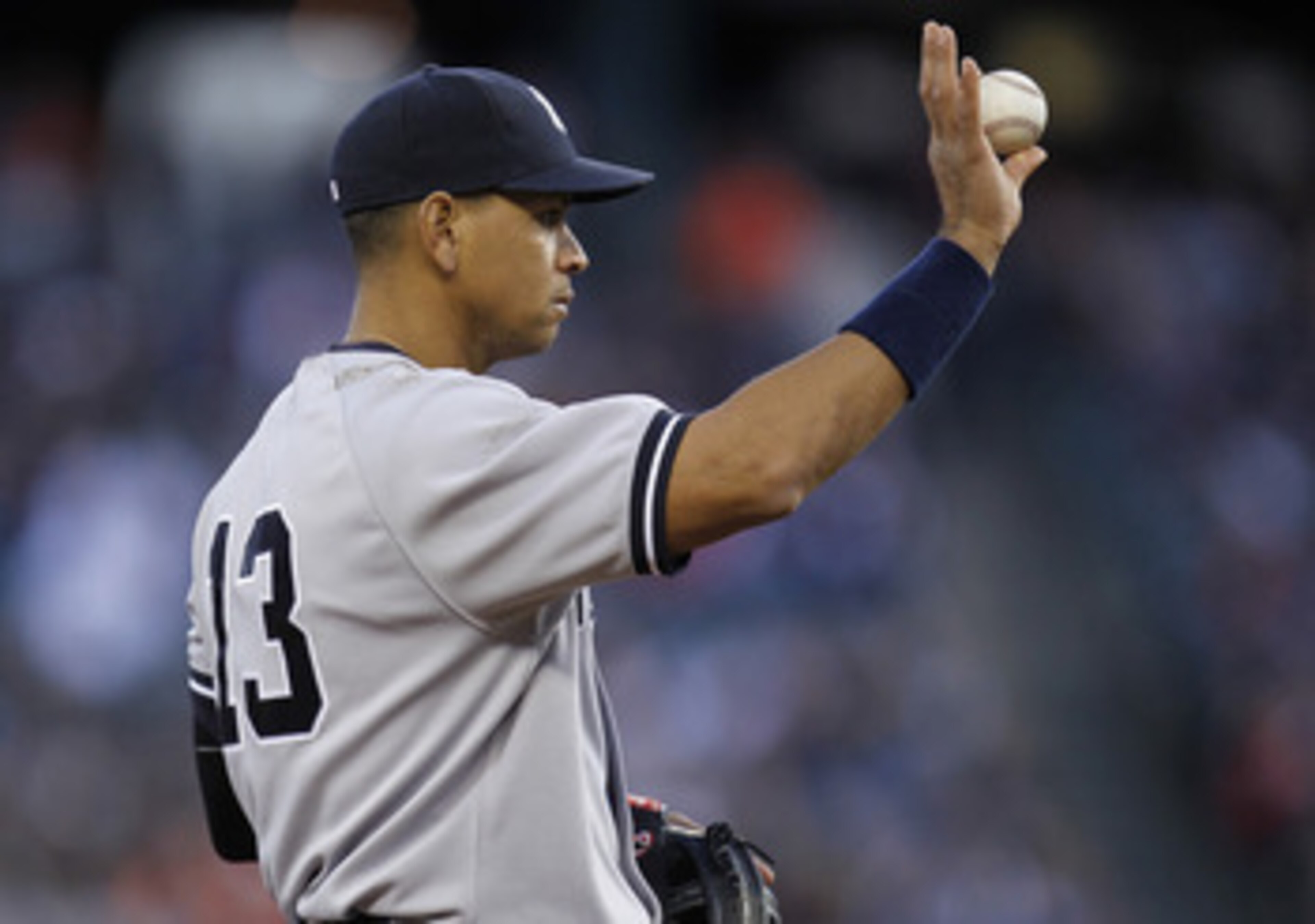 DETROIT, MI - MAY 04:  Alex Rodriguez #13 of the New York Yankees holds up the ball after tagging out a runner headed to third base while playing the Detroit Tigers at Comerica Park on May 4, 2011 in Detroit, Michigan. Detroit won the game 4-0. (Photo by 