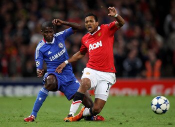 MANCHESTER, ENGLAND - APRIL 12:  Ramires of Chelsea brings down Nani of Manchester United and is subsequently sent off during the UEFA Champions League Quarter Final second leg match between Manchester United and Chelsea at Old Trafford on April 12, 2011 