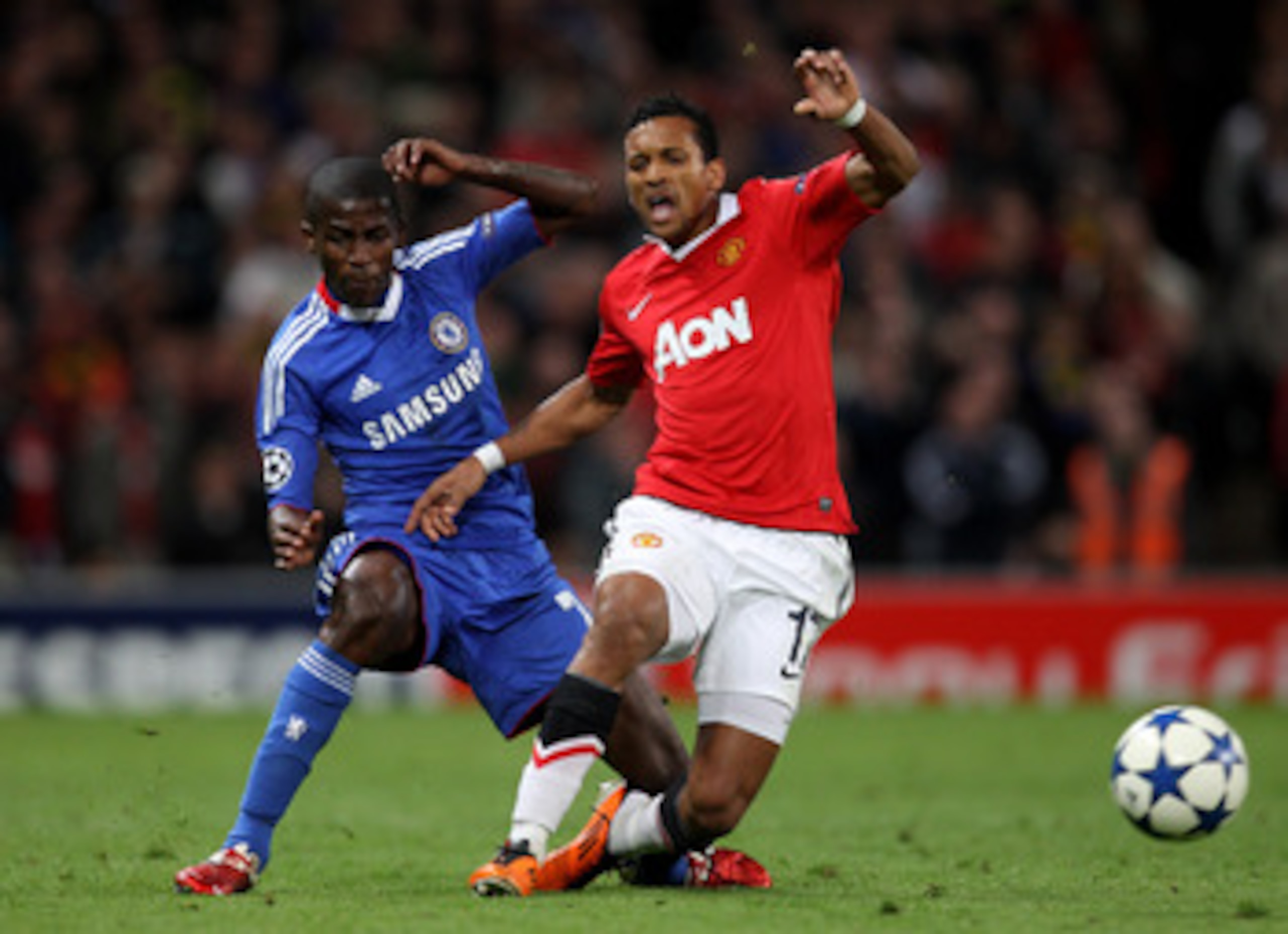 MANCHESTER, ENGLAND - APRIL 12:  Ramires of Chelsea brings down Nani of Manchester United and is subsequently sent off during the UEFA Champions League Quarter Final second leg match between Manchester United and Chelsea at Old Trafford on April 12, 2011 