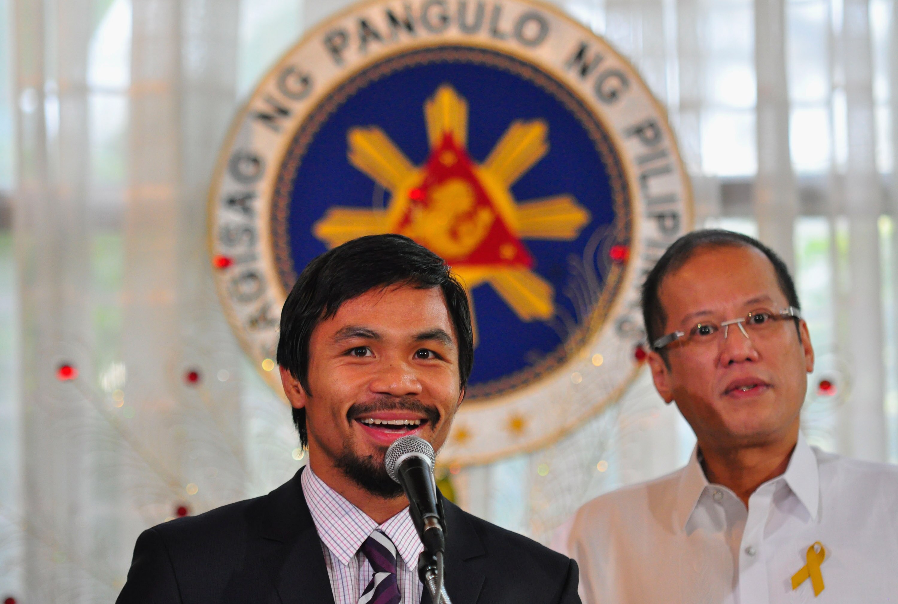 MANILA, PHILIPPINES - NOVEMBER 20:  Boxer and congressman, Manny Pacquiao addresses the audience at Malacanang Palace in Manila following his win of the WBC super welterweight crown against Mexican Antonio Margarito on November 20, 2010 in Manila, Philipp