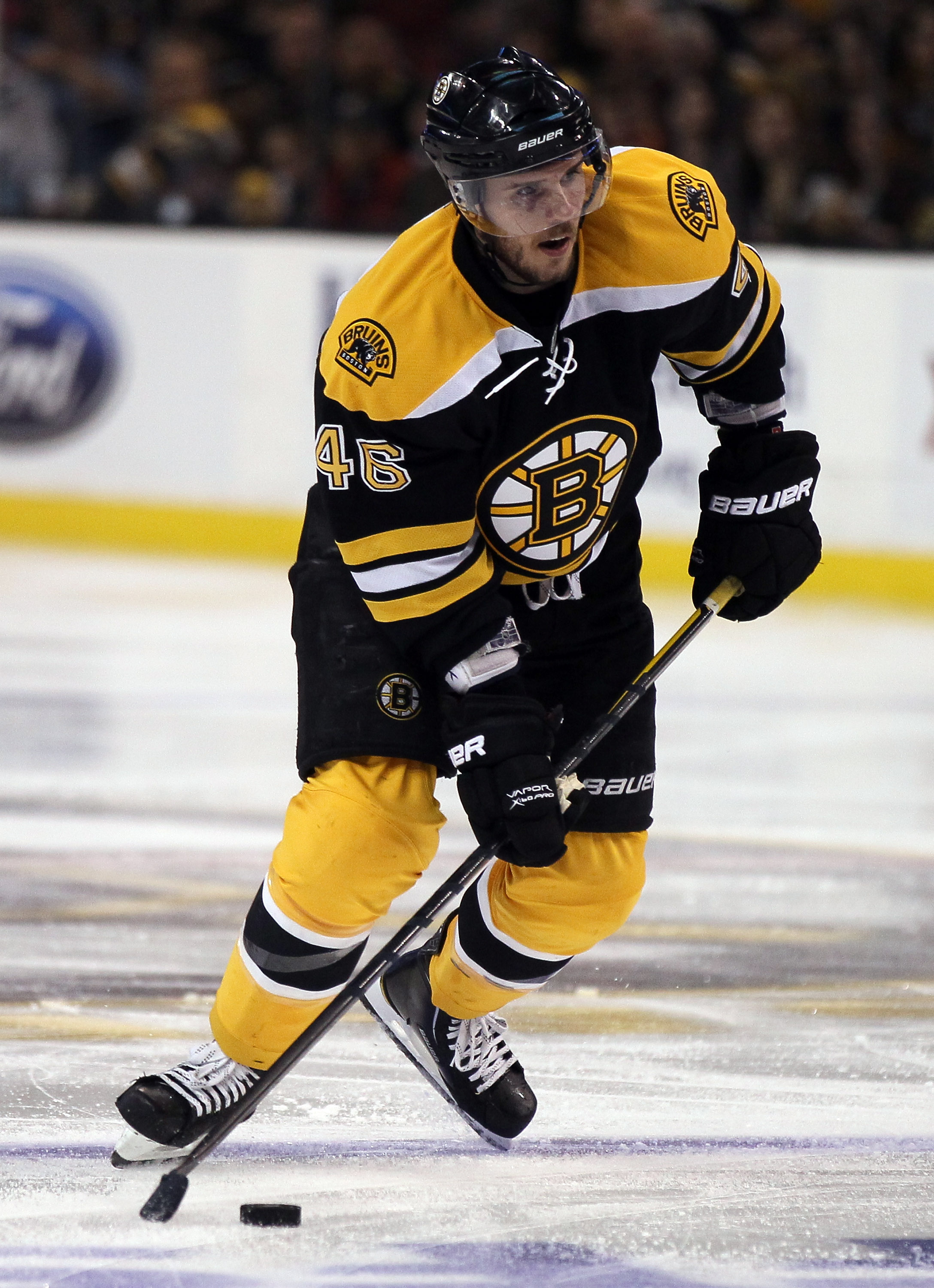 BOSTON, MA - MAY 06:  David Krejci #46 of the Boston Bruins takes the puck in the third period against the Philadelphia Flyers in Game Four of the Eastern Conference Semifinals during the 2011 NHL Stanley Cup Playoffs at TD Garden on May 6, 2011 in Boston