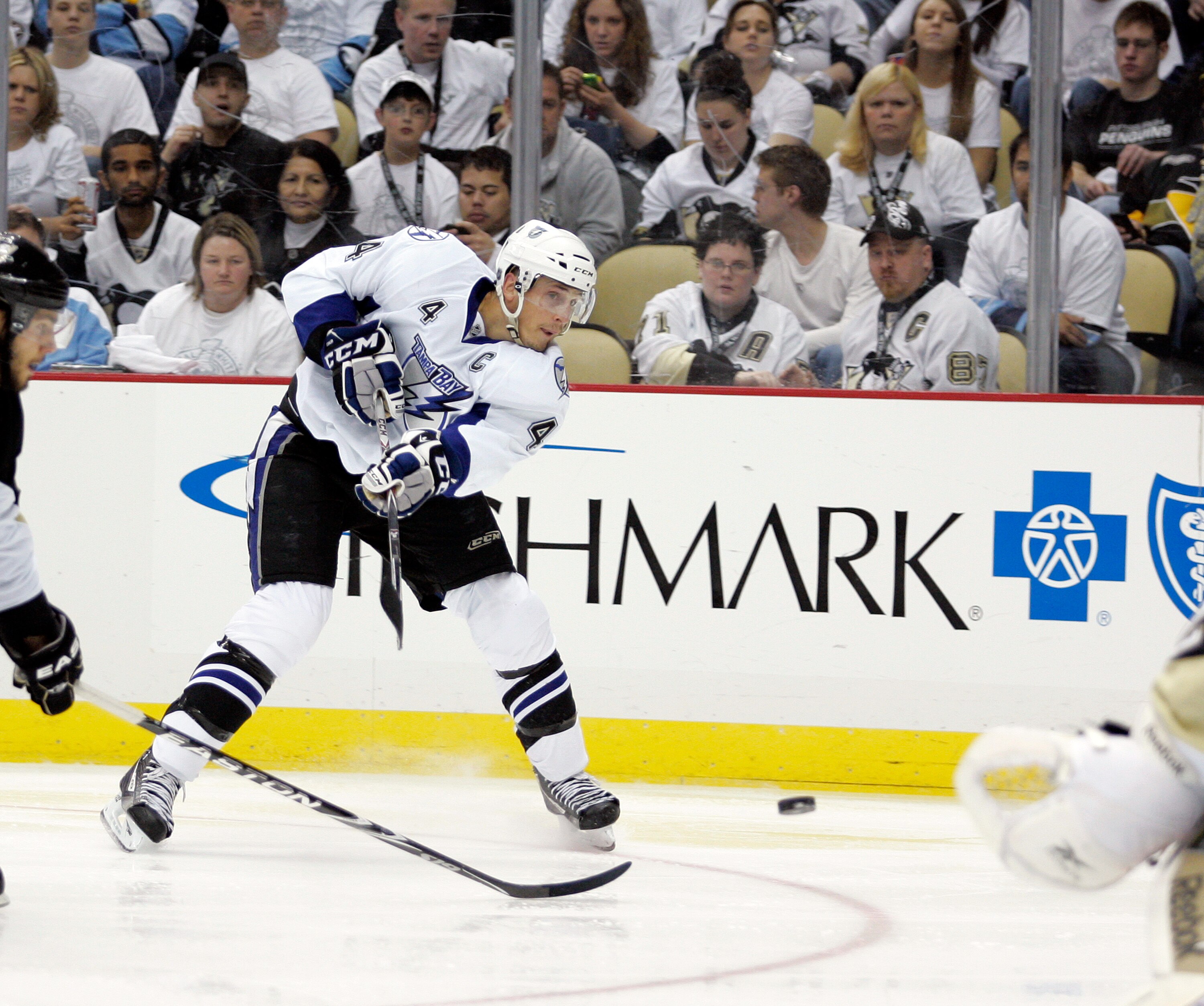 PITTSBURGH, PA - APRIL 23:  Vincent Lecavalier #4 of the Tampa Bay Lightning takes a shot on goal against the Pittsburgh Penguins in Game Five of the Eastern Conference Quarterfinals during the 2011 NHL Stanley Cup Playoffs at Consol Energy Center on Apri