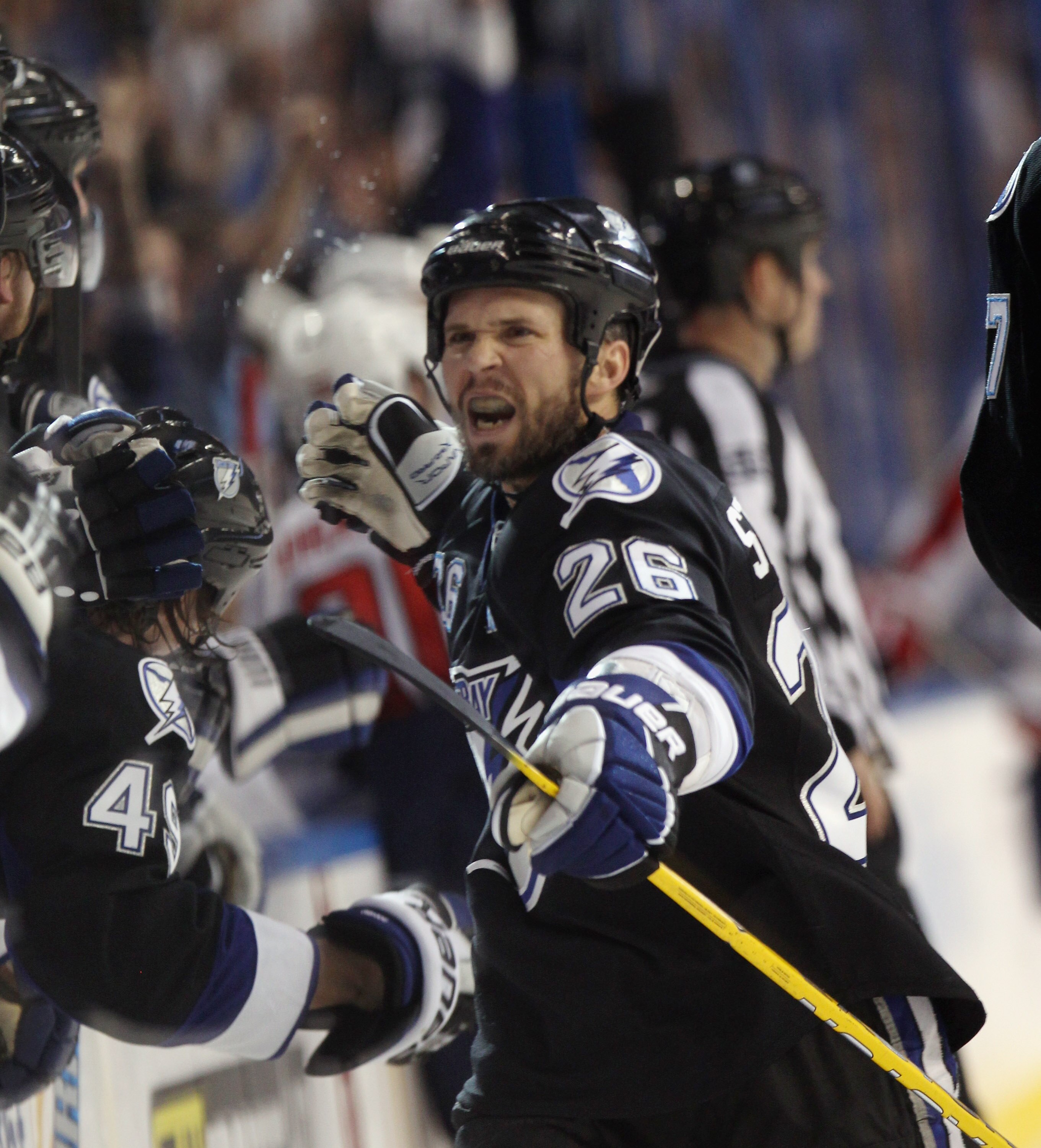TAMPA, FL - MAY 04: Martin St. Louis #26 of the Tampa Bay Lightning celebrates his goal at 16:52 of the third period against the Washington Capitals in Game Four of the Eastern Conference Semifinals during the 2011 NHL Stanley Cup Playoffs at the St Pete