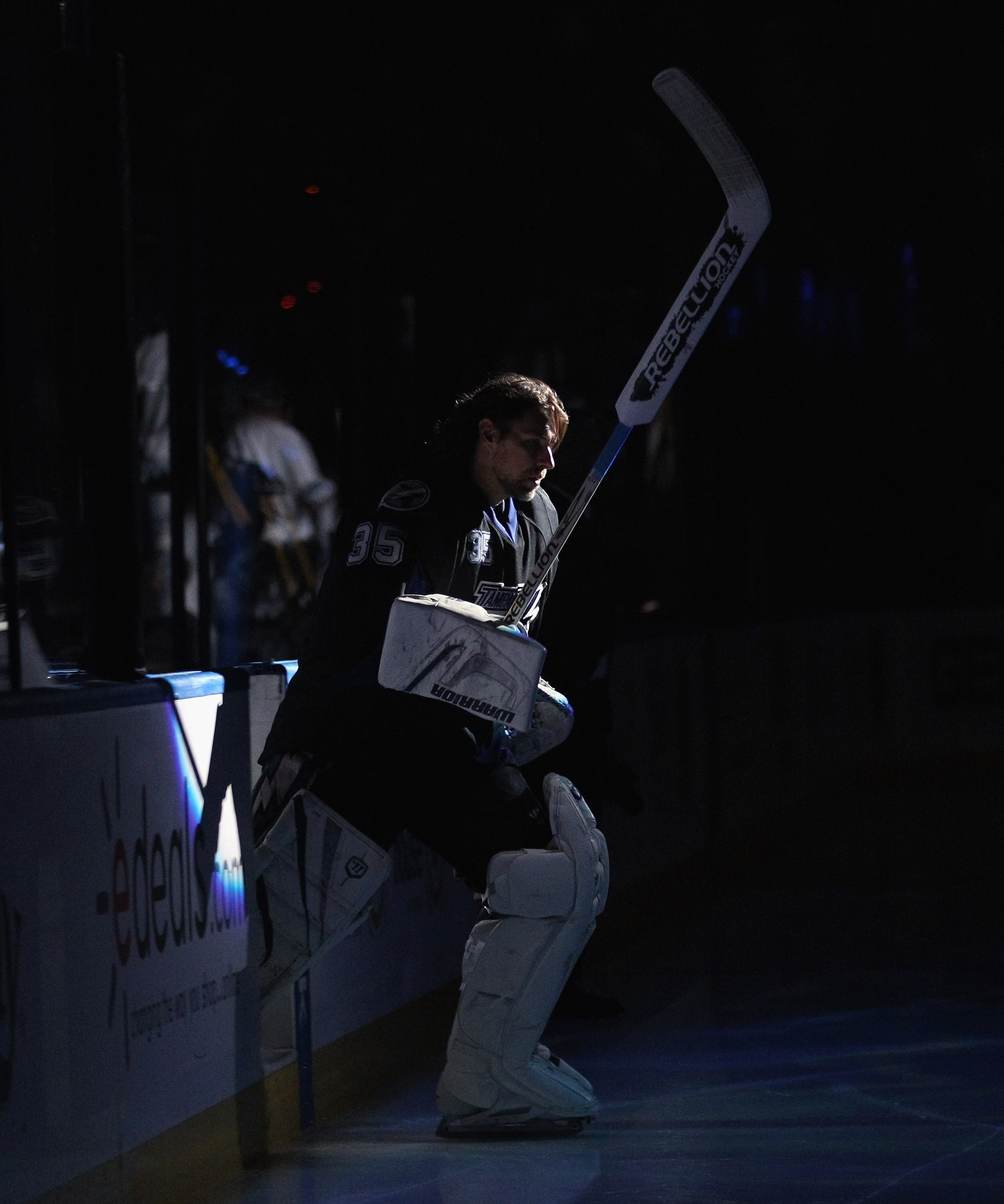 TAMPA, FL - MAY 04: Dwayne Roloson #35 of the Tampa Bay Lightning leads his team out to play against the Washington Capitals in Game Four of the Eastern Conference Semifinals during the 2011 NHL Stanley Cup Playoffs at the St Pete Times Forum on May 4, 20
