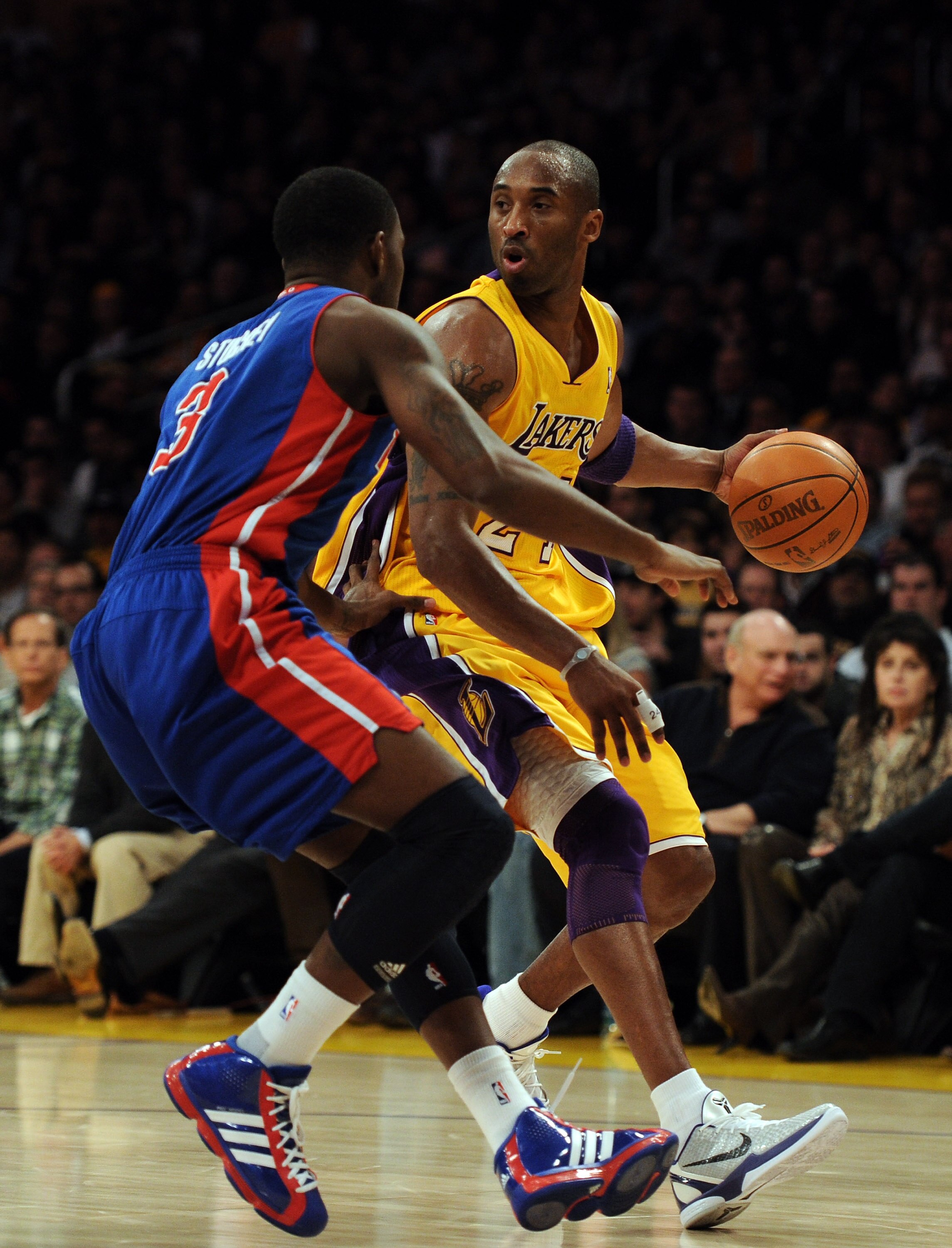 LOS ANGELES, CA - JANUARY 04:  Kobe Bryant #24 of the Los Angeles Lakers dribbles in front of Rodney Stuckey #3 of the Detroit Pistons at the Staples Center on January 4, 2011 in Los Angeles, California. NOTE TO USER: User expressly acknowledges and agree