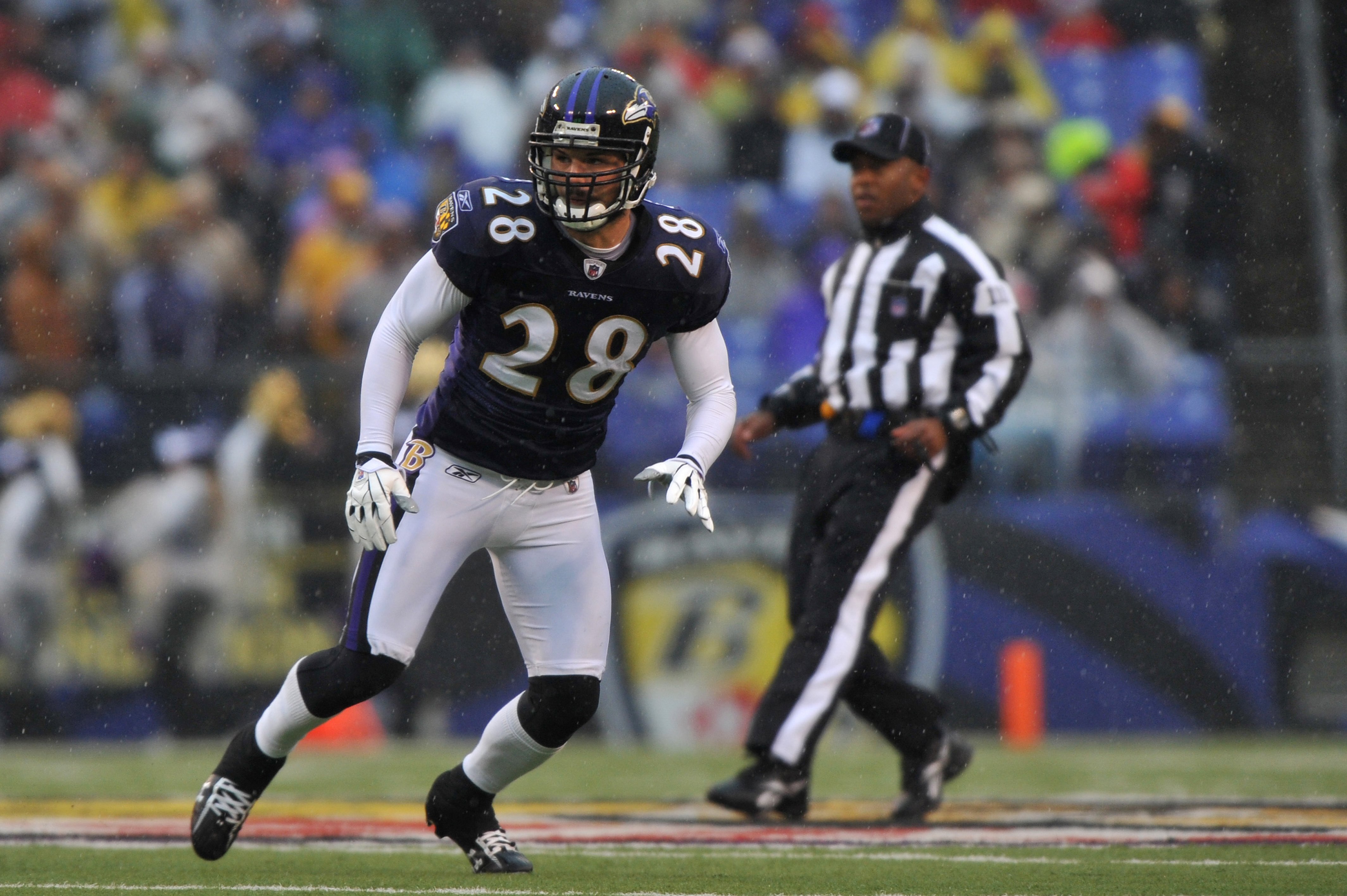 BALTIMORE - DECEMBER 13:  Tom Zbikowski #28 of the Baltimore Ravens defends against the Detroit Lions at M&T Bank Stadium on December 13, 2009 in Baltimore, Maryland. The Ravens defeated the Lions 48-3. (Photo by Larry French/Getty Images)