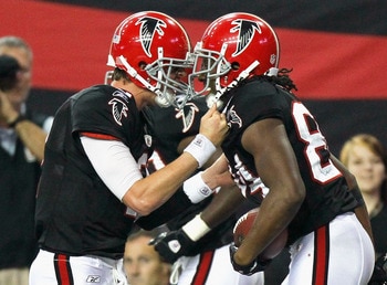 ATLANTA - NOVEMBER 11:  Quarterback Matt Ryan #2 and Roddy White #84 of the Atlanta Falcons react after White's touchdown reception in the final seconds against the Baltimore Ravens at Georgia Dome on November 11, 2010 in Atlanta, Georgia.  (Photo by Kevi