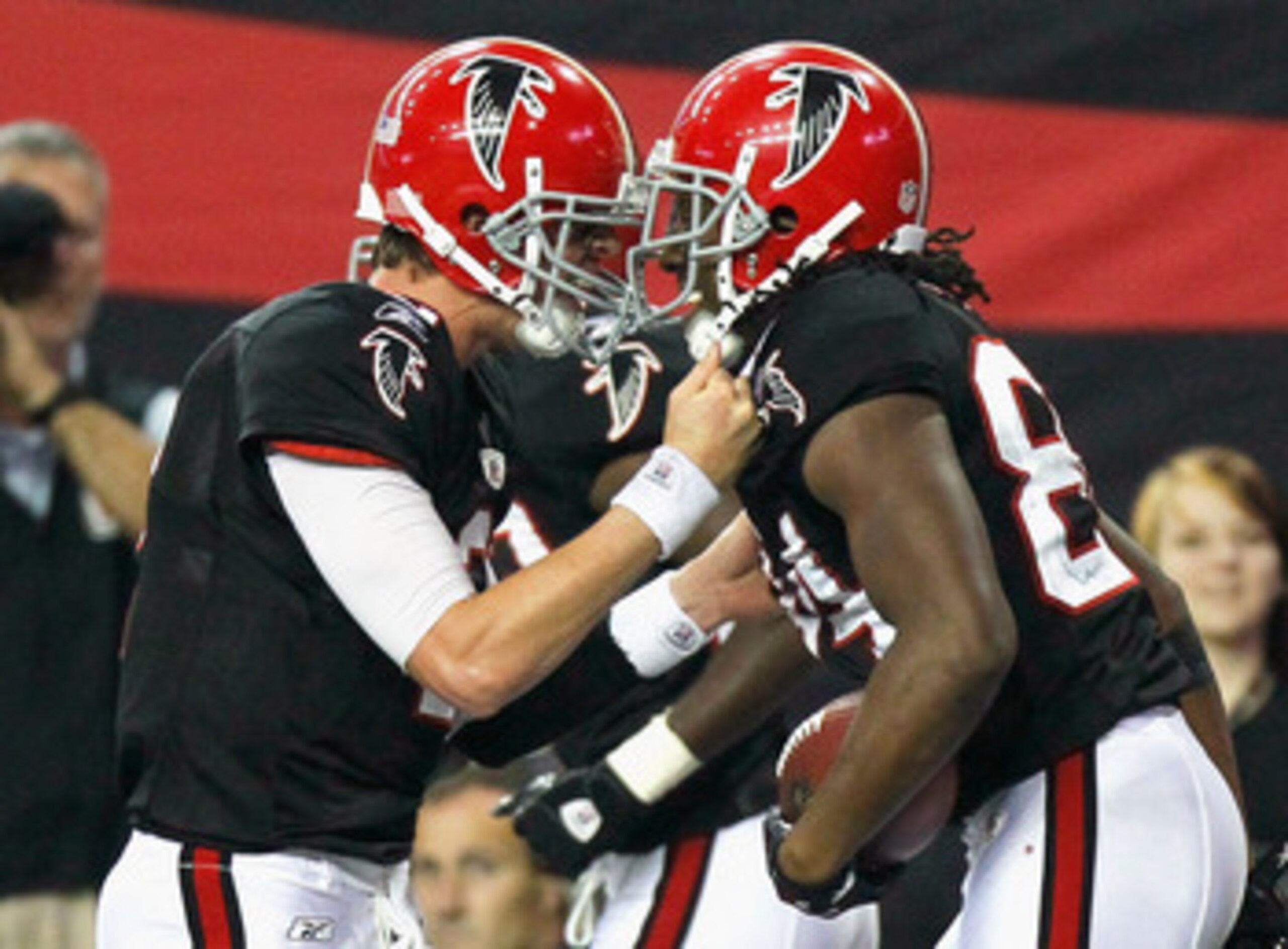 ATLANTA - NOVEMBER 11:  Quarterback Matt Ryan #2 and Roddy White #84 of the Atlanta Falcons react after White's touchdown reception in the final seconds against the Baltimore Ravens at Georgia Dome on November 11, 2010 in Atlanta, Georgia.  (Photo by Kevi
