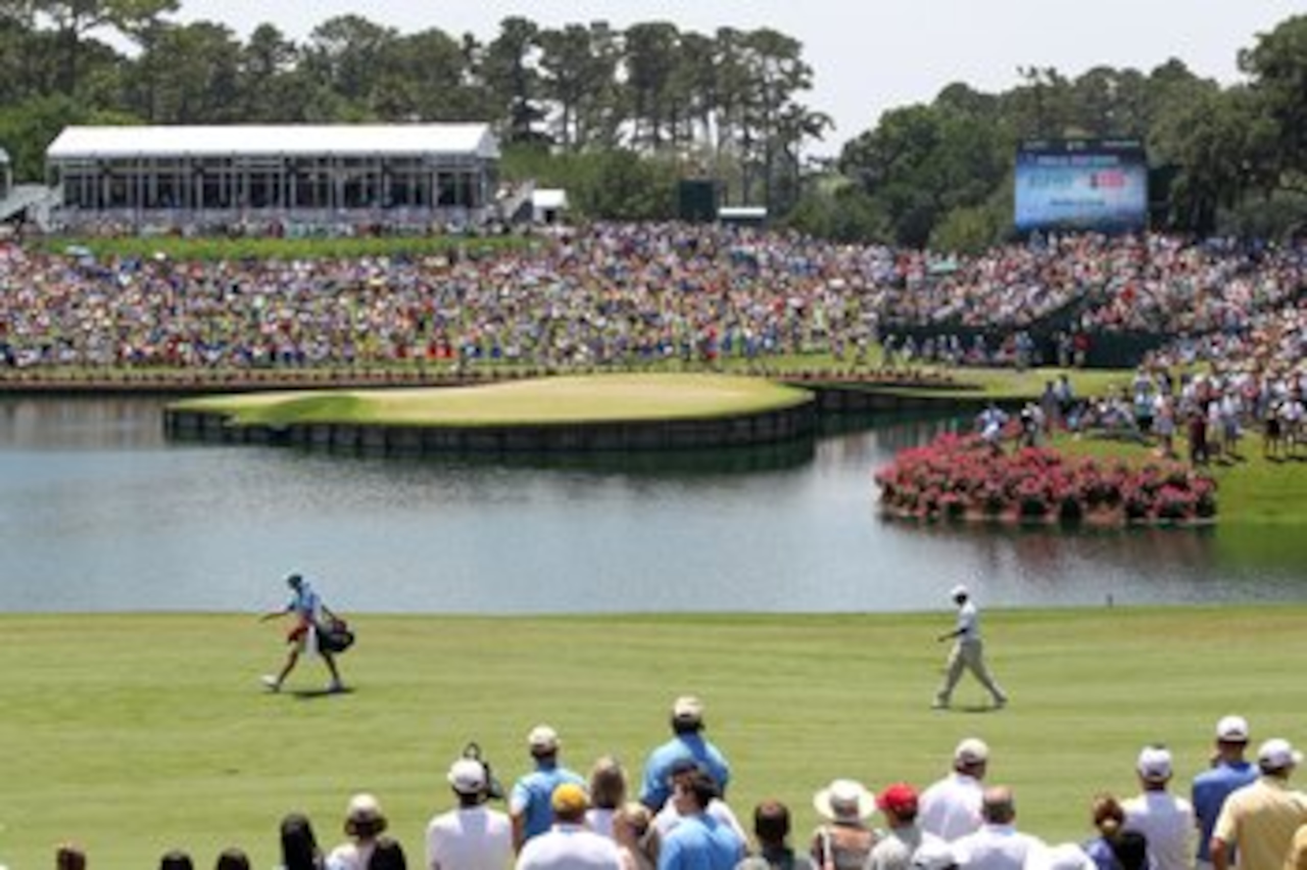 PONTE VEDRA BEACH, FL - MAY 8:  Tiger Woods and caddie Steve Williams walk up the 16th fairway during the third round of THE PLAYERS Championship on THE PLAYERS Stadium Course at TPC Sawgrass on May 8, 2010 in Ponte Vedra Beach, Florida. (Photo by Jamie S