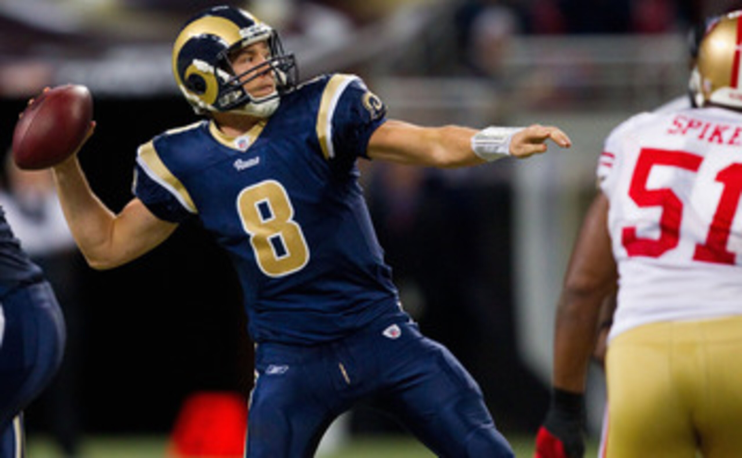 ST. LOUIS, MO - DECEMBER 26: Sam Bradford #8 of the St. Louis Rams passes against the San Francisco 49ers at the Edward Jones Dome on December 26, 2010 in St. Louis, Missouri. The Rams beat the 49ers 25-17. (Photo by Dilip Vishwanat/Getty Images)