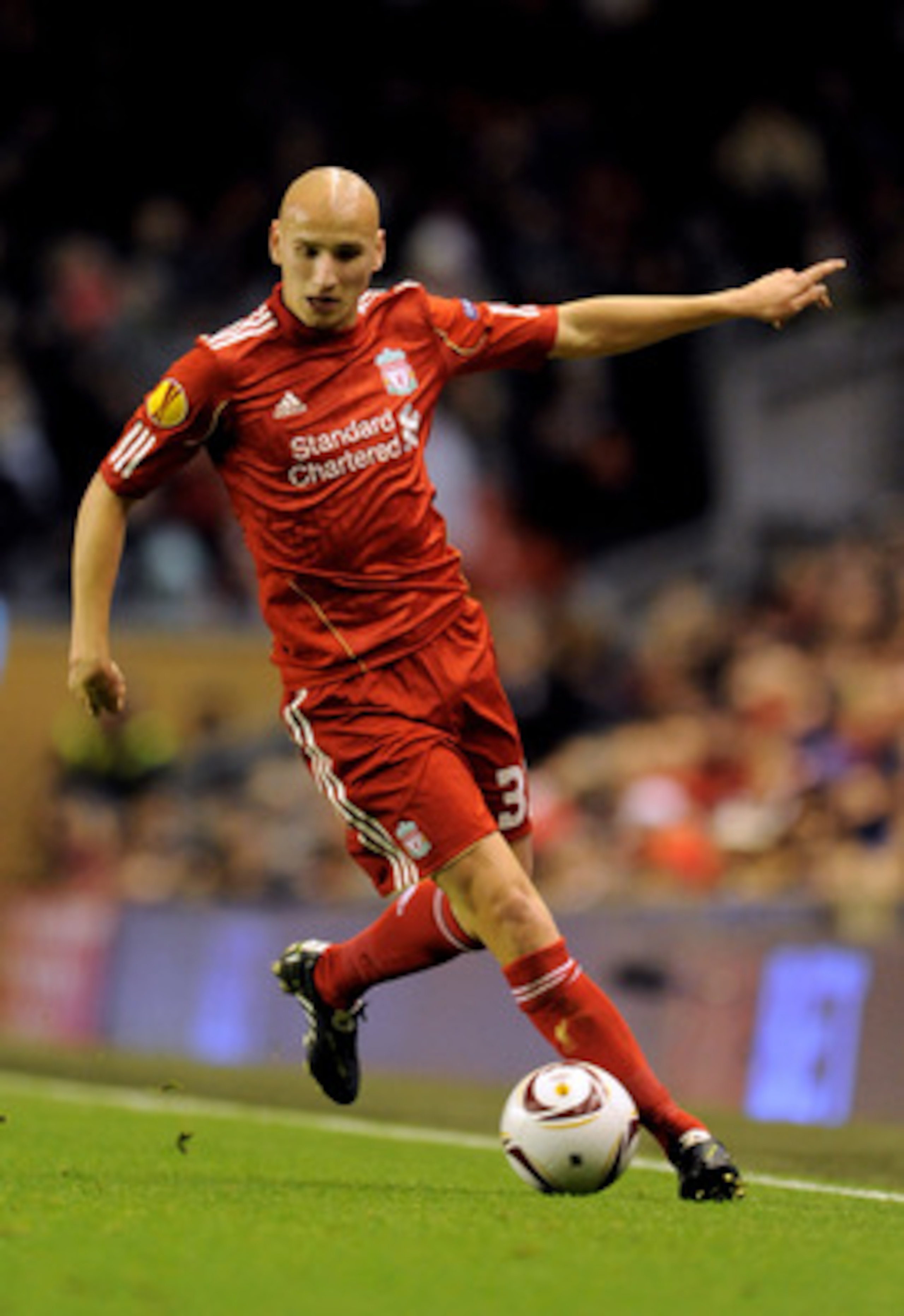 LIVERPOOL, ENGLAND - DECEMBER 15:  Jonjo Shelvey of Liverpool runs with the ball during the UEFA Europa League Group K match between Liverpool and FC Utrecht at Anfield on December 15, 2010 in Liverpool, England.  (Photo by Clint Hughes/Getty Images)