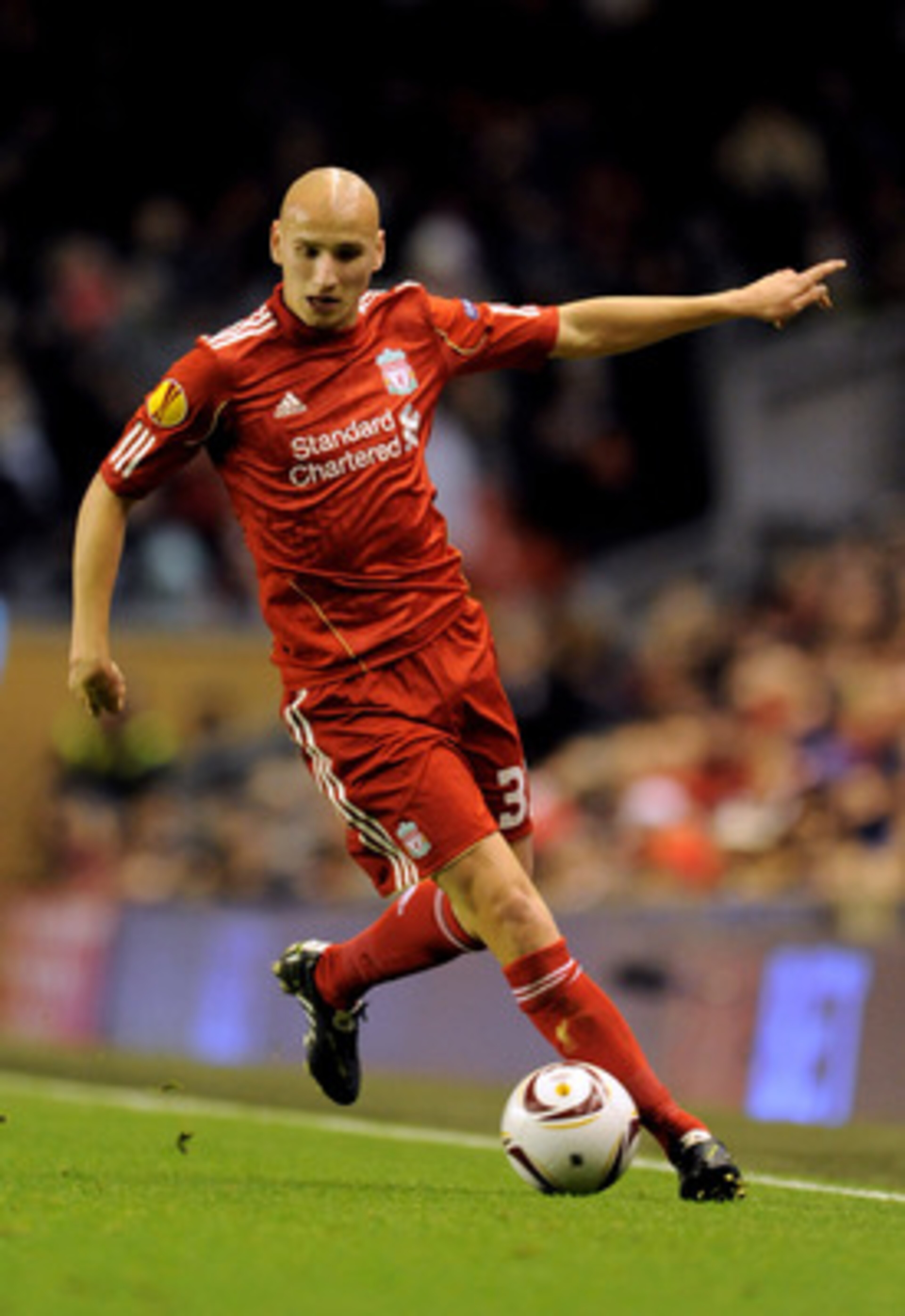 LIVERPOOL, ENGLAND - DECEMBER 15:  Jonjo Shelvey of Liverpool runs with the ball during the UEFA Europa League Group K match between Liverpool and FC Utrecht at Anfield on December 15, 2010 in Liverpool, England.  (Photo by Clint Hughes/Getty Images)
