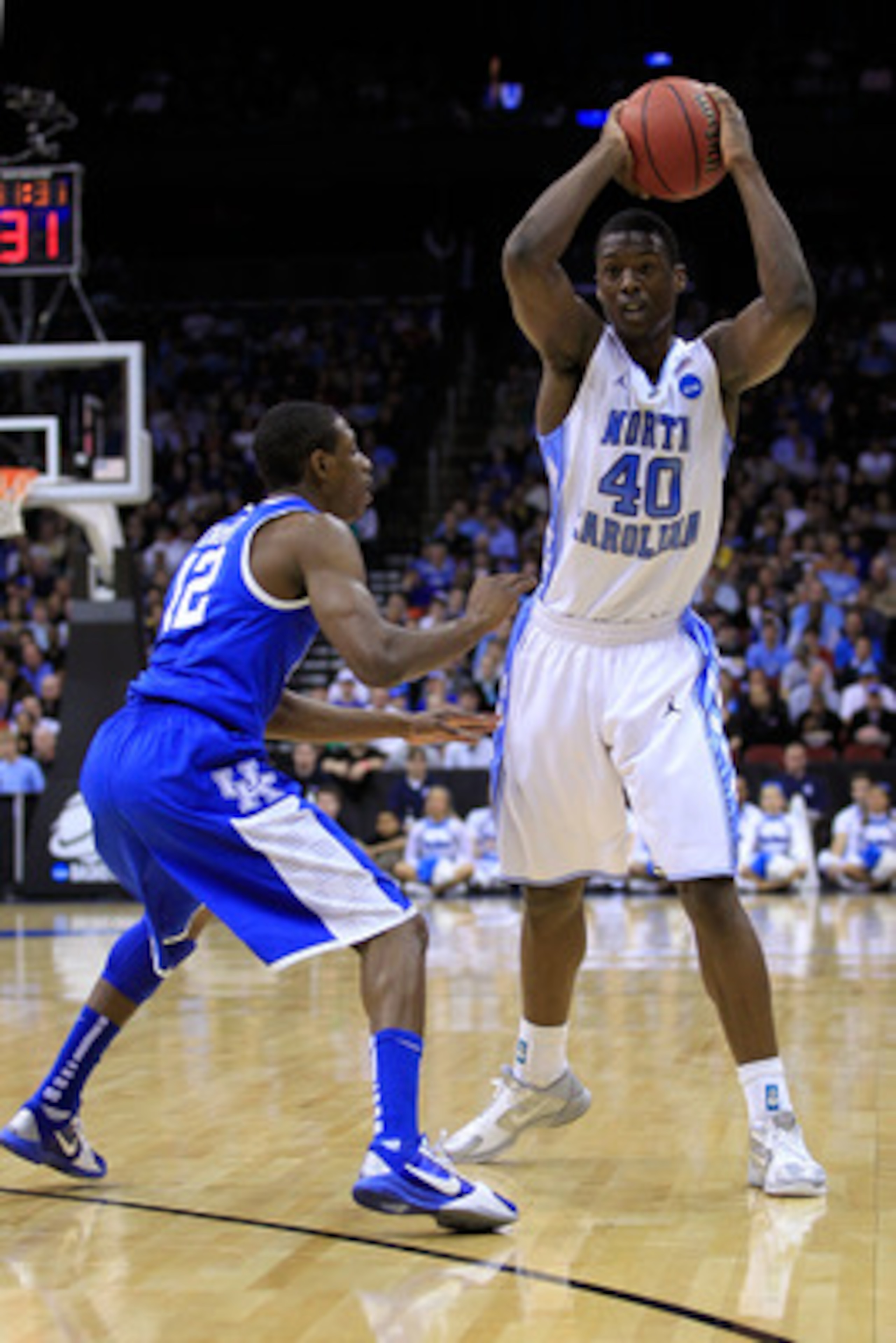 NEWARK, NJ - MARCH 27:  Harrison Barnes #40 of the North Carolina Tar Heels in action against Brandon Knight #12 of the Kentucky Wildcats during the east regional final of the 2011 NCAA men's basketball tournament at Prudential Center on March 27, 2011 in