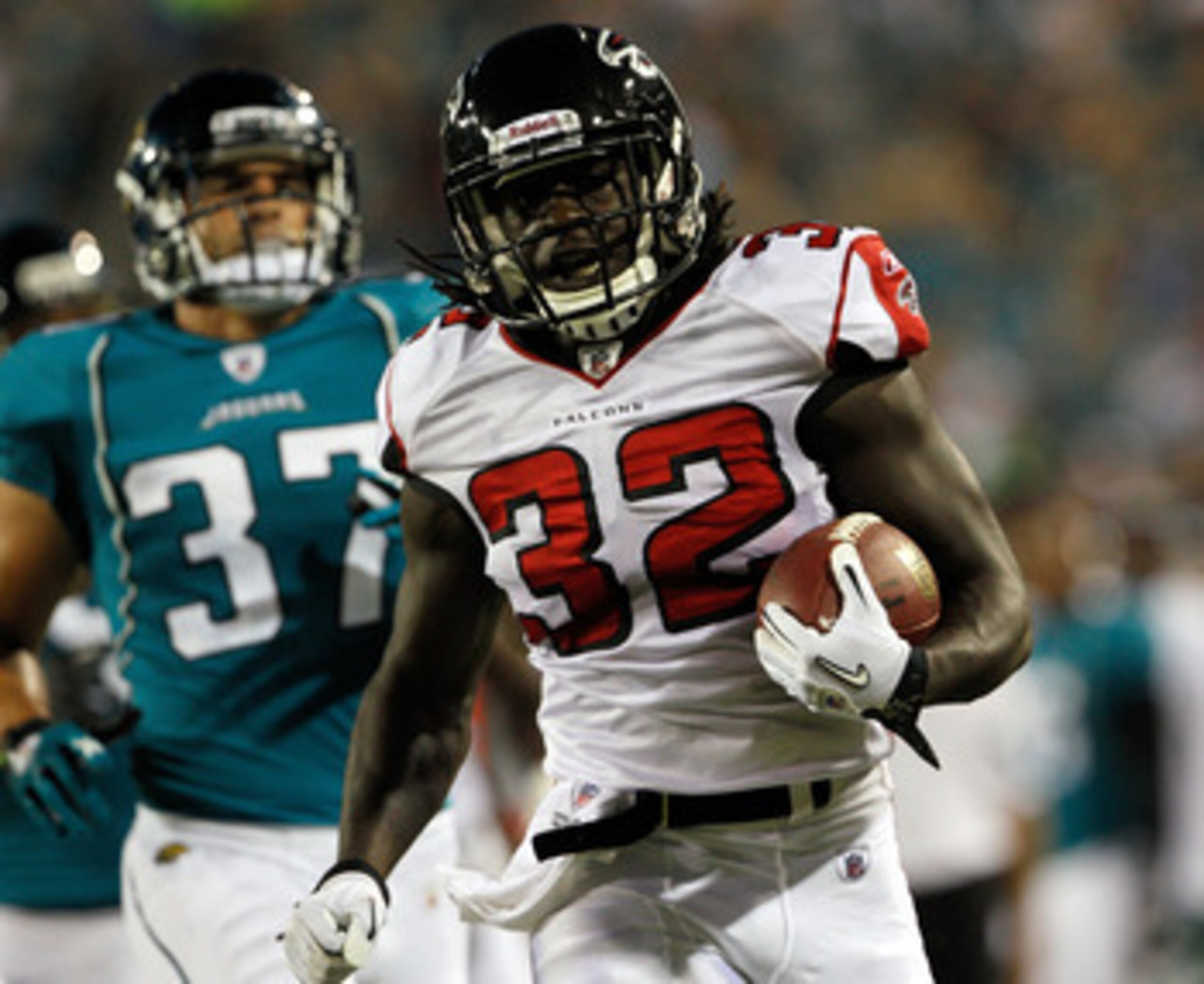 JACKSONVILLE, FL - SEPTEMBER 02: Jerious Norwood #32 of the Atlanta Falcons runs for yardage during a preseason game against the Jacksonville Jaguars at EverBank Field on September 2, 2010 in Jacksonville, Florida. (Photo by Sam Greenwood/Getty Images) JACKSONVILLE, FL - SEPTEMBER 02: Jerious Norwood #32 of the Atlanta Falcons runs for yardage during a preseason game against the Jacksonville Jaguars at EverBank Field on September 2, 2010 in Jacksonville, Florida. (Photo by Sam Greenwood/Getty Images)