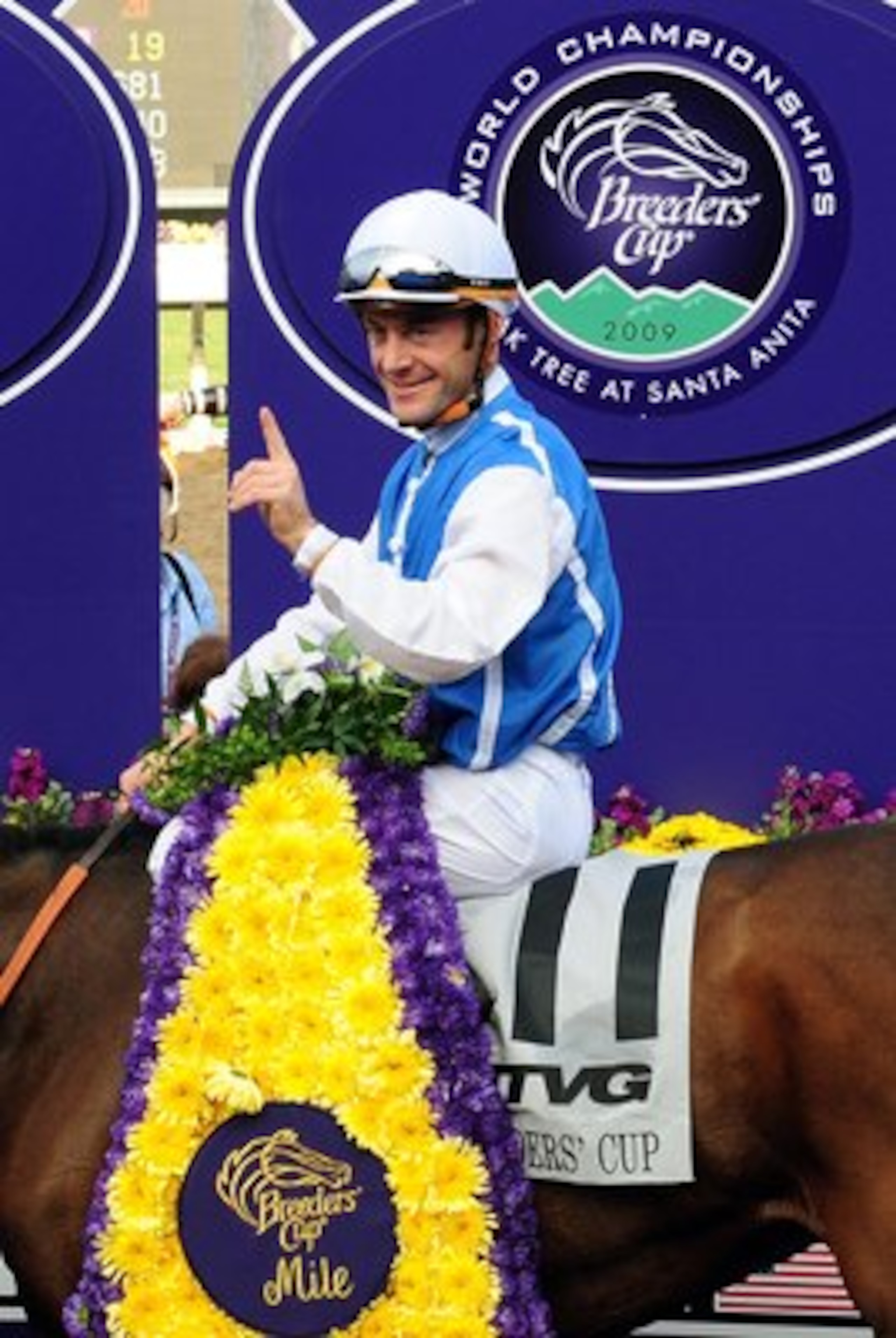 ARCADIA, CA - NOVEMBER 07:  Jockey Olivier Peslier celebrates winning the TVG Breeders' Cup Mile race with Goldikova during the Breeders' Cup World Championships at Santa Anita Park November 7, 2009 in Arcadia, California.  (Photo by Jacob de Golish/Getty