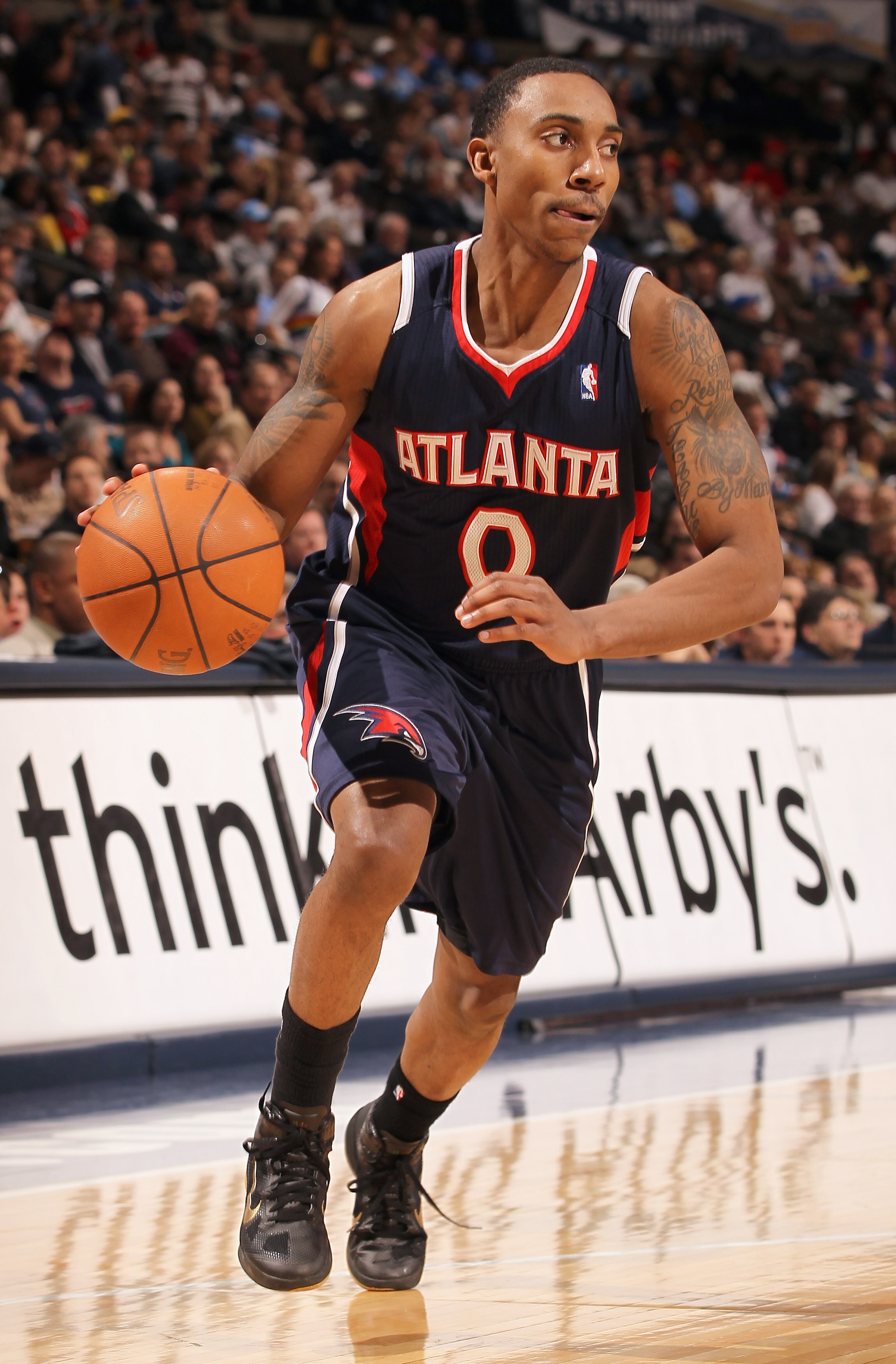 DENVER, CO - FEBRUARY 28:  Jeff Teague #0 of the Atlanta Hawks controls the ball against the Denver Nuggets during NBA action at the Pepsi Center on February 28, 2011 in Denver, Colorado. The Nuggets deafeated the Hawks 100-90. NOTE TO USER: User expressl