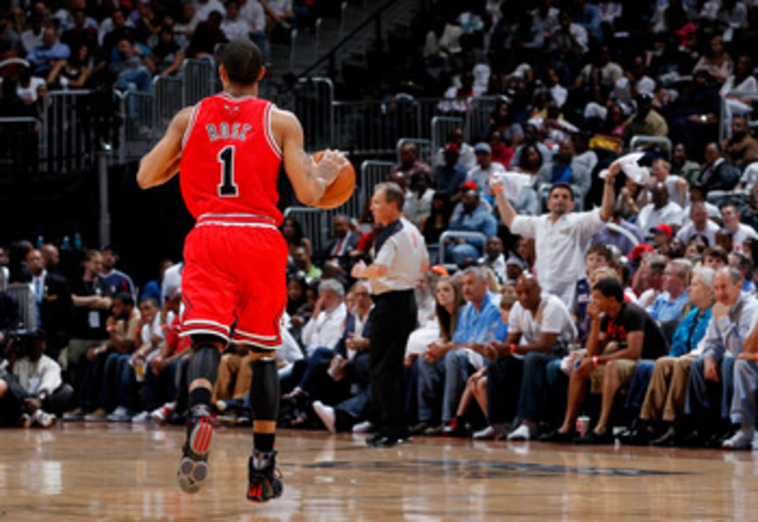 ATLANTA, GA - MAY 06:  Derrick Rose #1 of the Chicago Bulls runs the ball up the court against the Atlanta Hawks in Game Three of the Eastern Conference Semifinals in the 2011 NBA Playoffs at Phillips Arena on May 6, 2011 in Atlanta, Georgia.  NOTE TO USE
