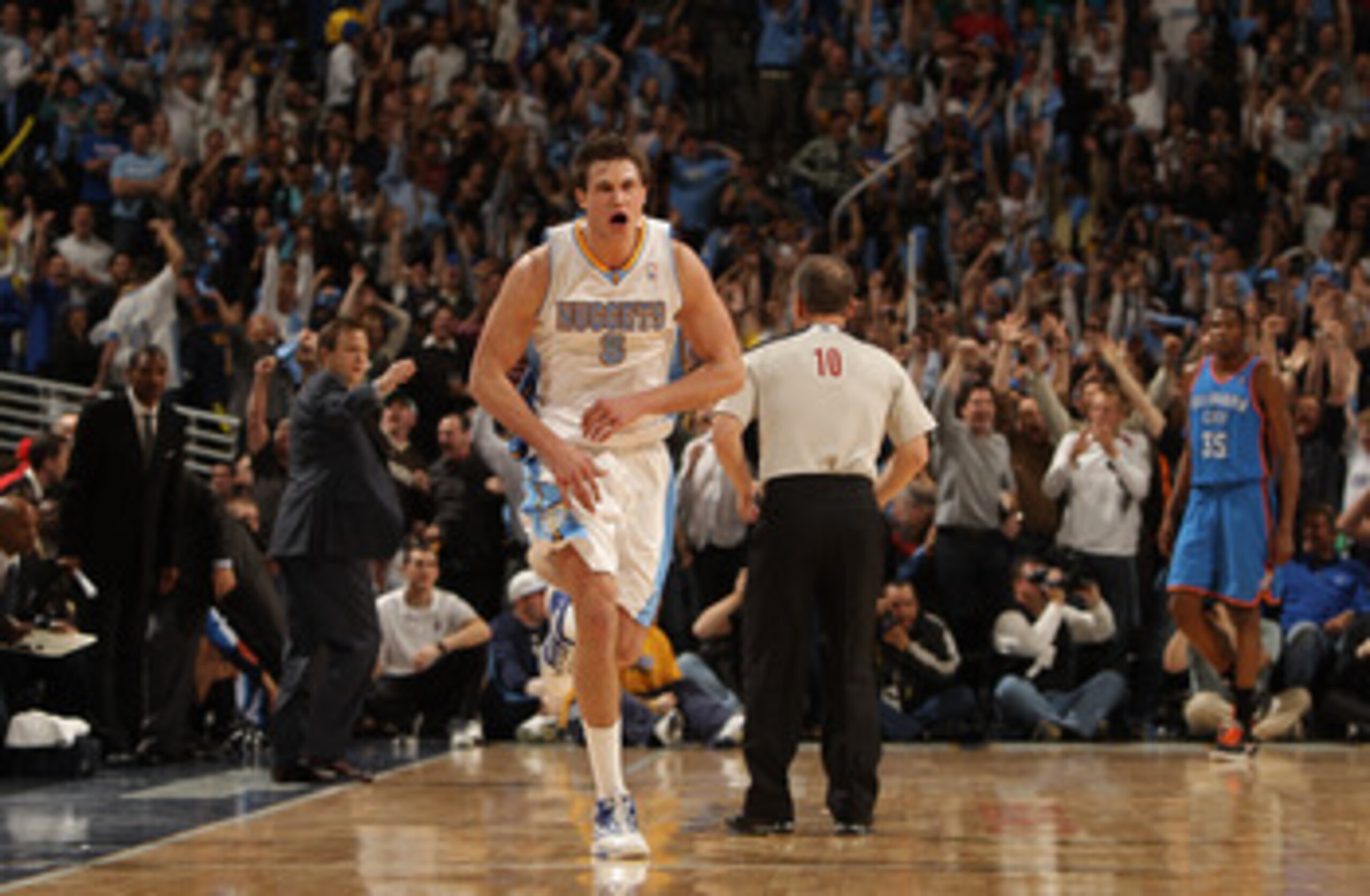 DENVER, CO - APRIL 25:  Danilo Gallinari #8 of the Denver Nuggets celebrates after hitting a three point basket against the Oklahoma City Thunder during the fourth quarter in Game Four of the Western Conference Quarterfinals in the 2011 NBA Playoffs at Pe