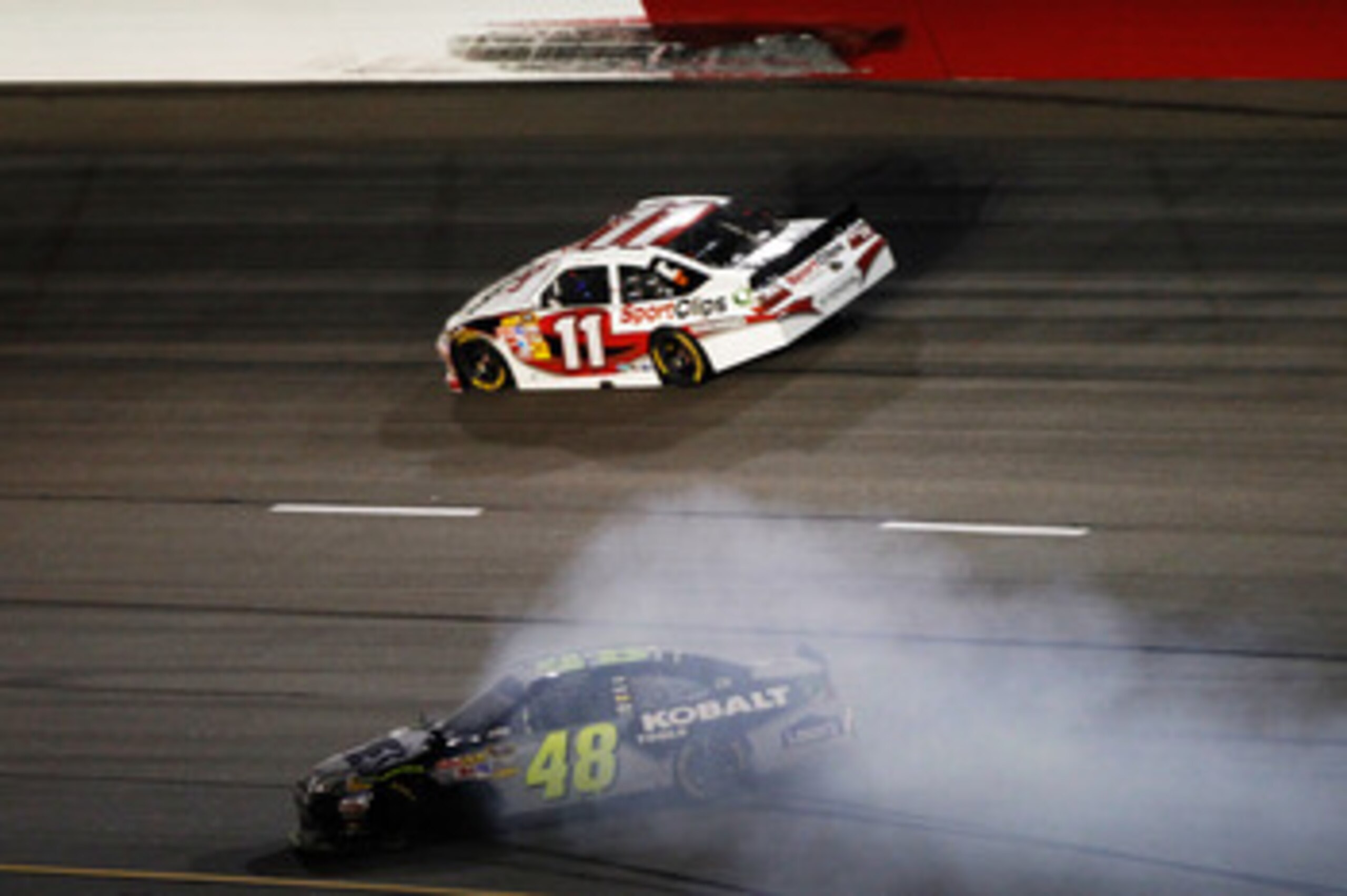 DARLINGTON, SC - MAY 07:  Jimmie Johnson, driver of the #48 Lowe's/Kobalt Tools Chevrolet, spins out during the NASCAR Sprint Cup Series SHOWTIME Southern 500 at Darlington Raceway on May 7, 2011 in Darlington, South Carolina.  (Photo by Jeff Zelevansky/G