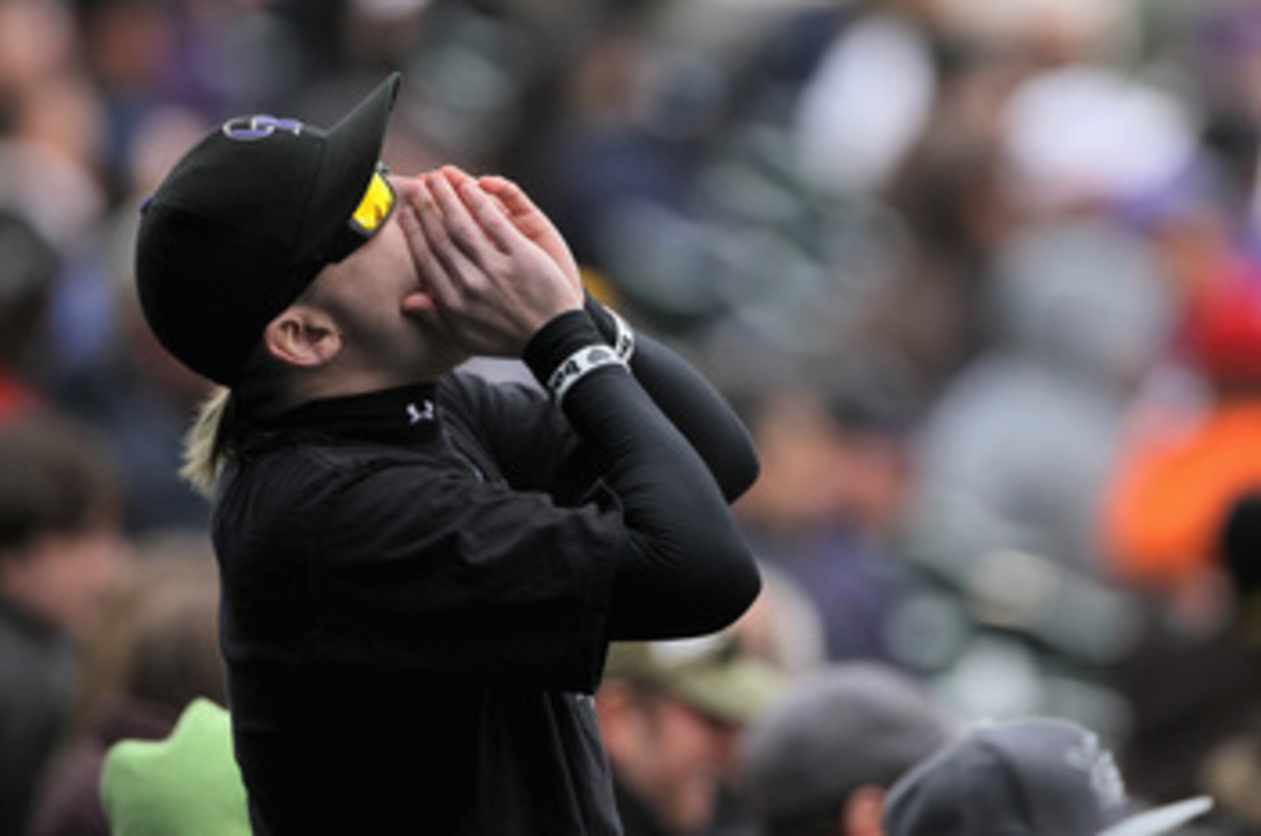 DENVER, CO - MAY 01: A fan cheers on the Colorado Rockies against the Pittsburgh Pirates at Coors Field on May 1, 2011 in Denver, Colorado. The Pirates defeated the Rockies 8-4. (Photo by Doug Pensinger/Getty Images) DENVER, CO - MAY 01: A fan cheers on the Colorado Rockies against the Pittsburgh Pirates at Coors Field on May 1, 2011 in Denver, Colorado. The Pirates defeated the Rockies 8-4. (Photo by Doug Pensinger/Getty Images)