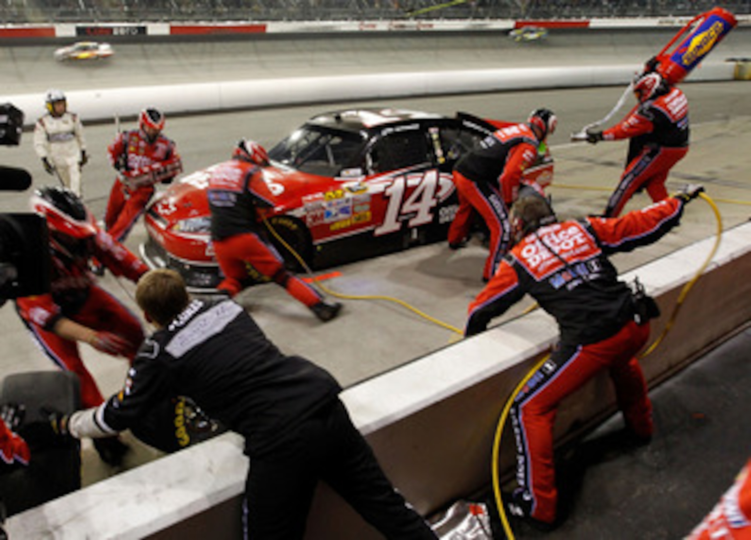 DARLINGTON, SC - MAY 07:  Tony Stewart pits the #14 Office Depot/Mobil 1 Chevrolet during the NASCAR Sprint Cup Series SHOWTIME Southern 500 at Darlington Raceway on May 7, 2011 in Darlington, South Carolina.  (Photo by Tom Pennington/Getty Images)