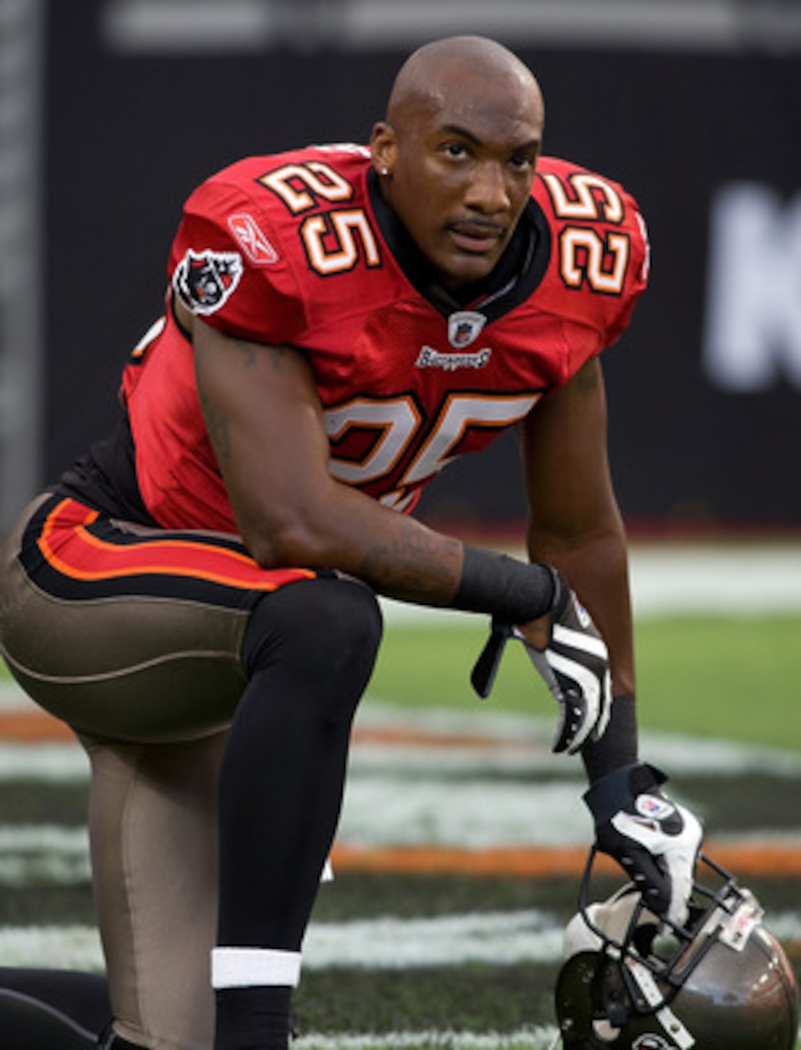 TAMPA, FL - SEPTEMBER 04:  Cornerback Aqib Talib #25 of the Tampa Bay Buccaneers rests against the Houston Texans during a preseason game at Raymond James Stadium on September 4, 2009 in Tampa, Florida.  (Photo by J. Meric/Getty Images)