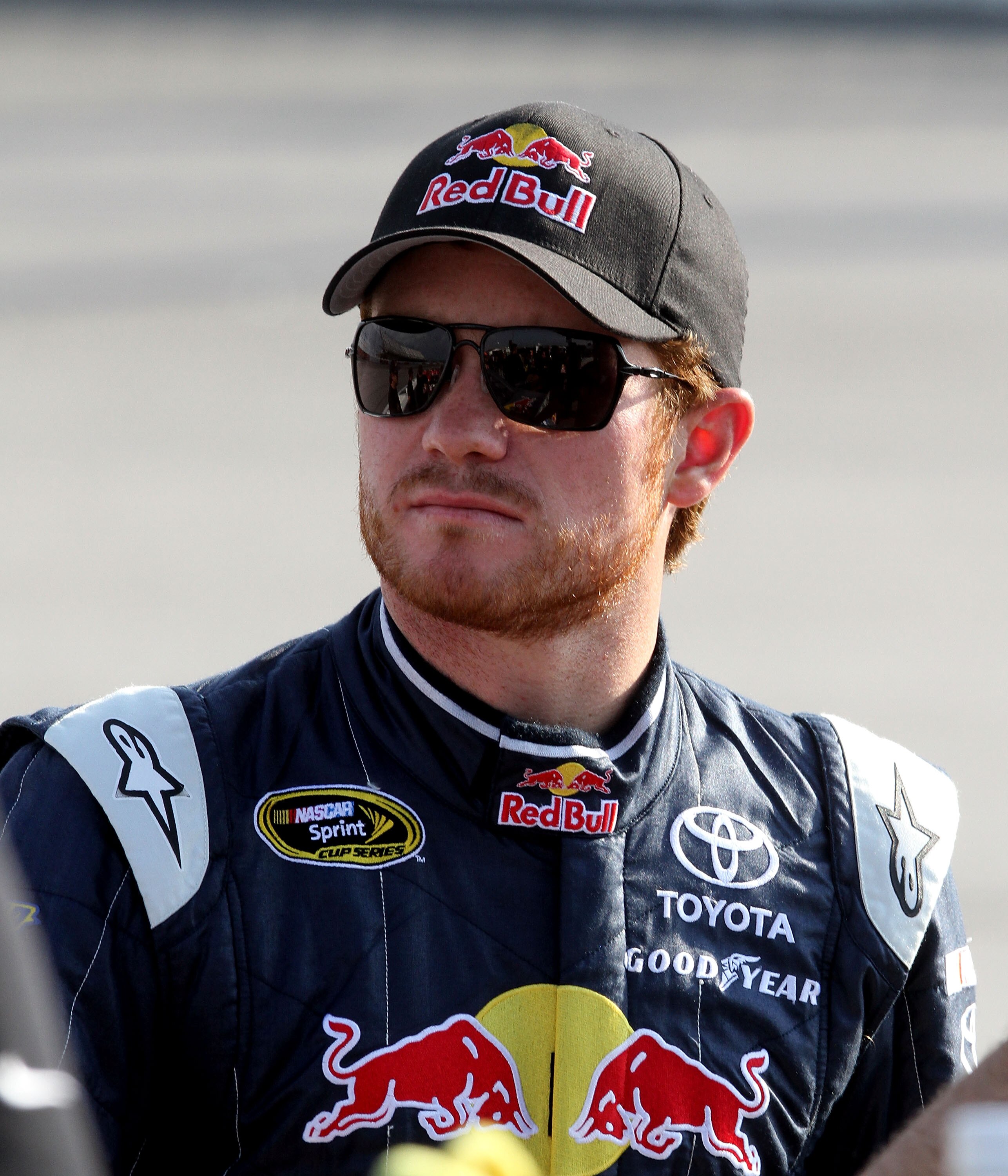 DARLINGTON, SC - MAY 06: Brian Vickers, driver of the #83 Red Bull Toyota, stands on pit road during qualifying for the NASCAR Sprint Cup Series SHOWTIME Southern 500 at Darlington Raceway on May 6, 2011 in Darlington, South Carolina.  (Photo by Jerry Mar