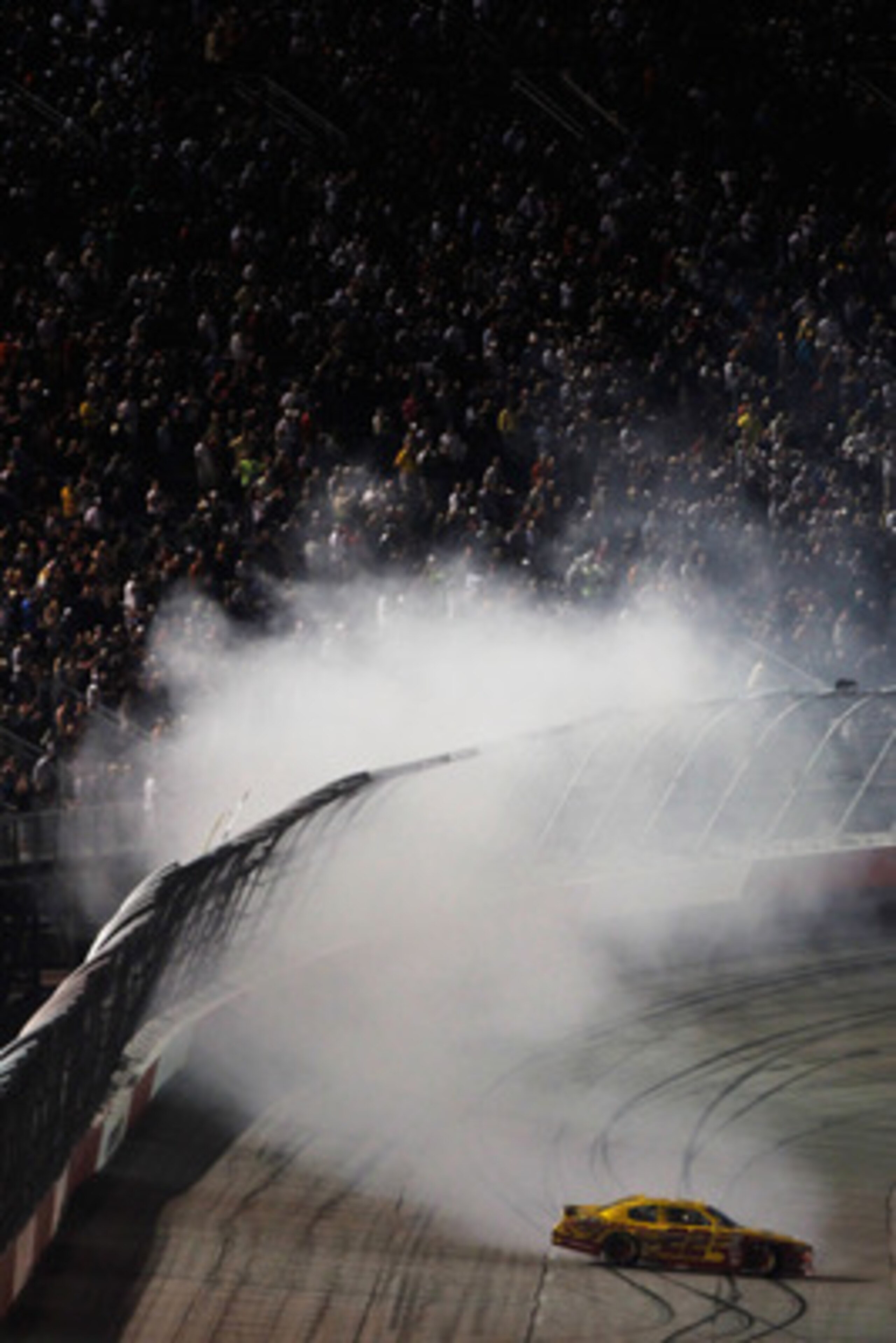 DARLINGTON, SC - MAY 07:  Kurt Busch, driver of the #22 Shell/Pennzoil Dodge, spins out during the NASCAR Sprint Cup Series SHOWTIME Southern 500 at Darlington Raceway on May 7, 2011 in Darlington, South Carolina.  (Photo by Jeff Zelevansky/Getty Images f