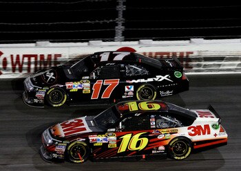 DARLINGTON, SC - MAY 07: Greg Biffle, driver of the #16 3M Ford races with Matt Kenseth, driver of the #17 Wiley X Eyewear Ford, during the NASCAR Sprint Cup Series SHOWTIME Southern 500 at Darlington Raceway on May 7, 2011 in Darlington, South Carolina. 