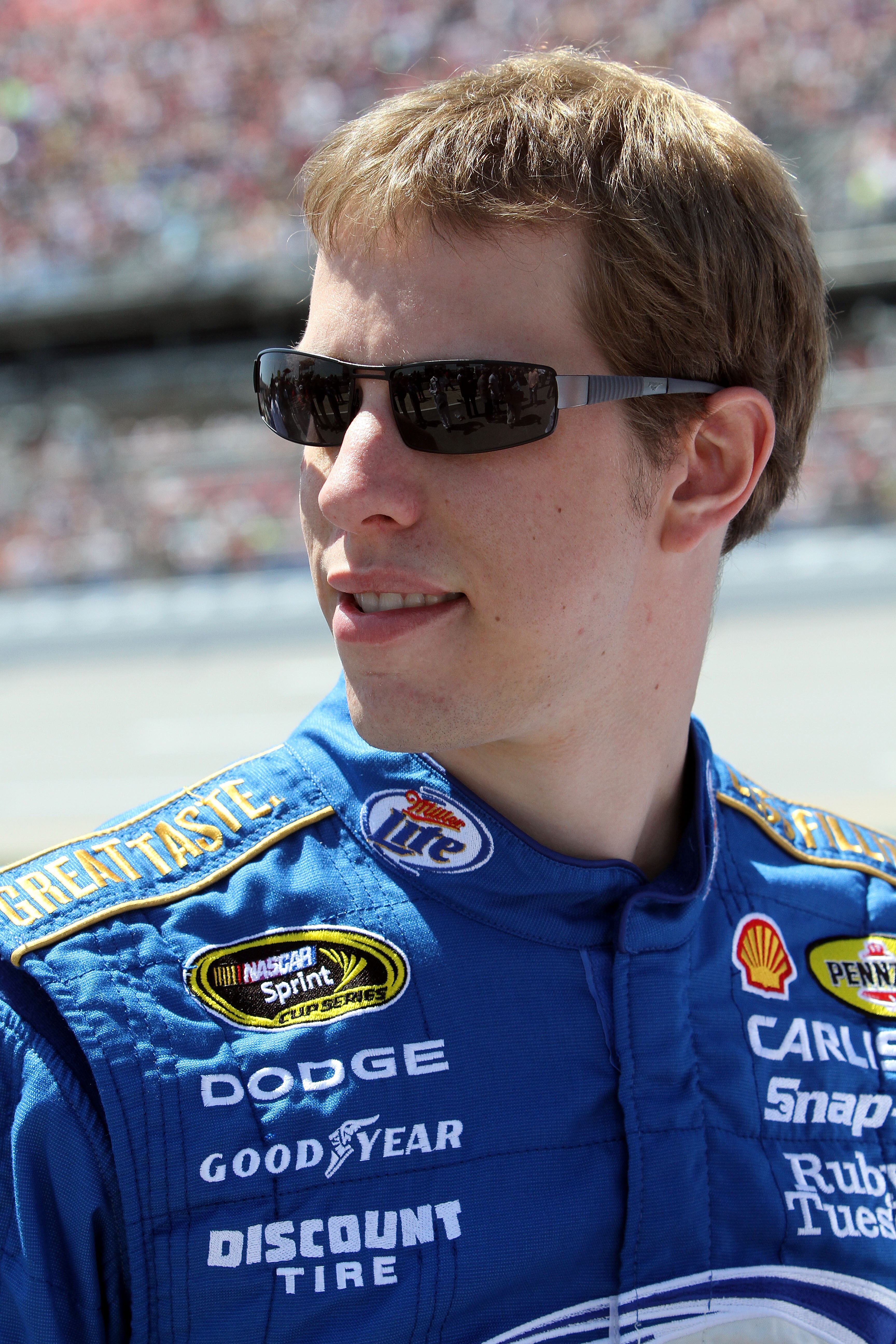 TALLADEGA, AL - APRIL 17:  Brad Keselowski, driver of the #2 Miller Lite Dodge, stands on the grid prior to the start of the NASCAR Sprint Cup Series Aaron's 499 at Talladega Superspeedway on April 17, 2011 in Talladega, Alabama.  (Photo by Jerry Markland