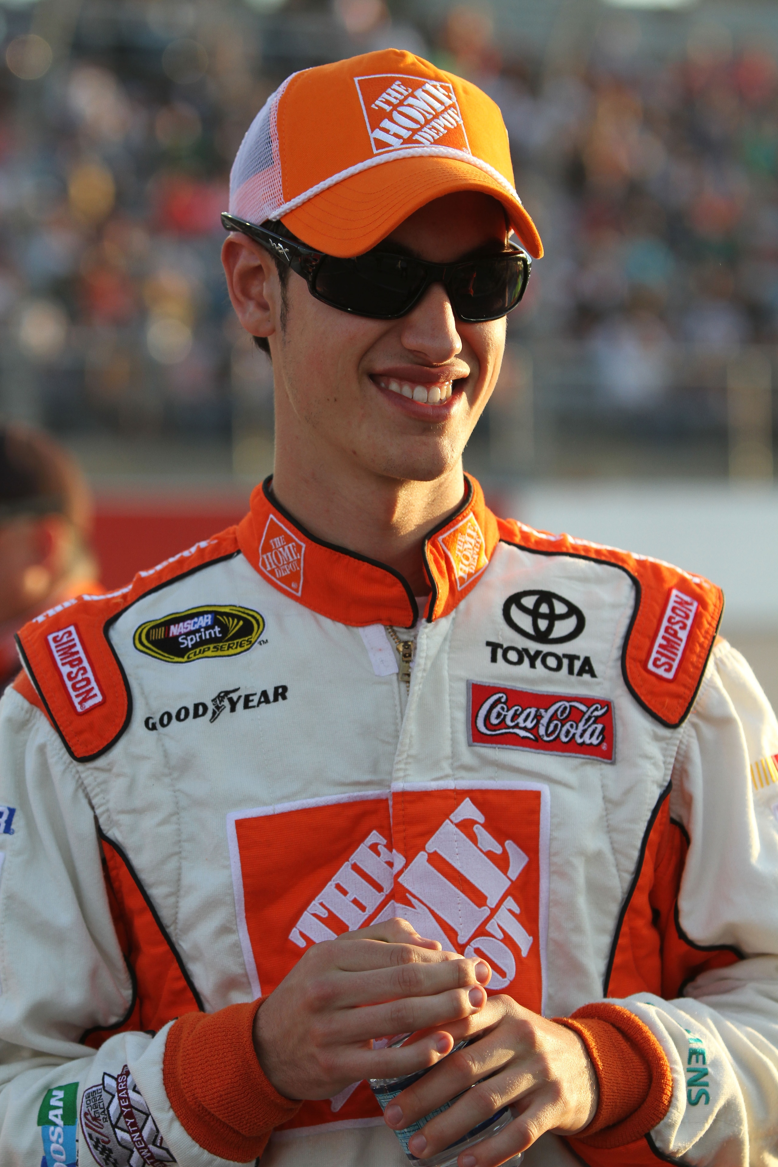 DARLINGTON, SC - MAY 07:  Joey Logano, driver of the #20 The Home Depot Toyota, stands on the grid prior to the NASCAR Sprint Cup Series SHOWTIME Southern 500 at Darlington Raceway on May 7, 2011 in Darlington, South Carolina.  (Photo by Jerry Markland/Ge