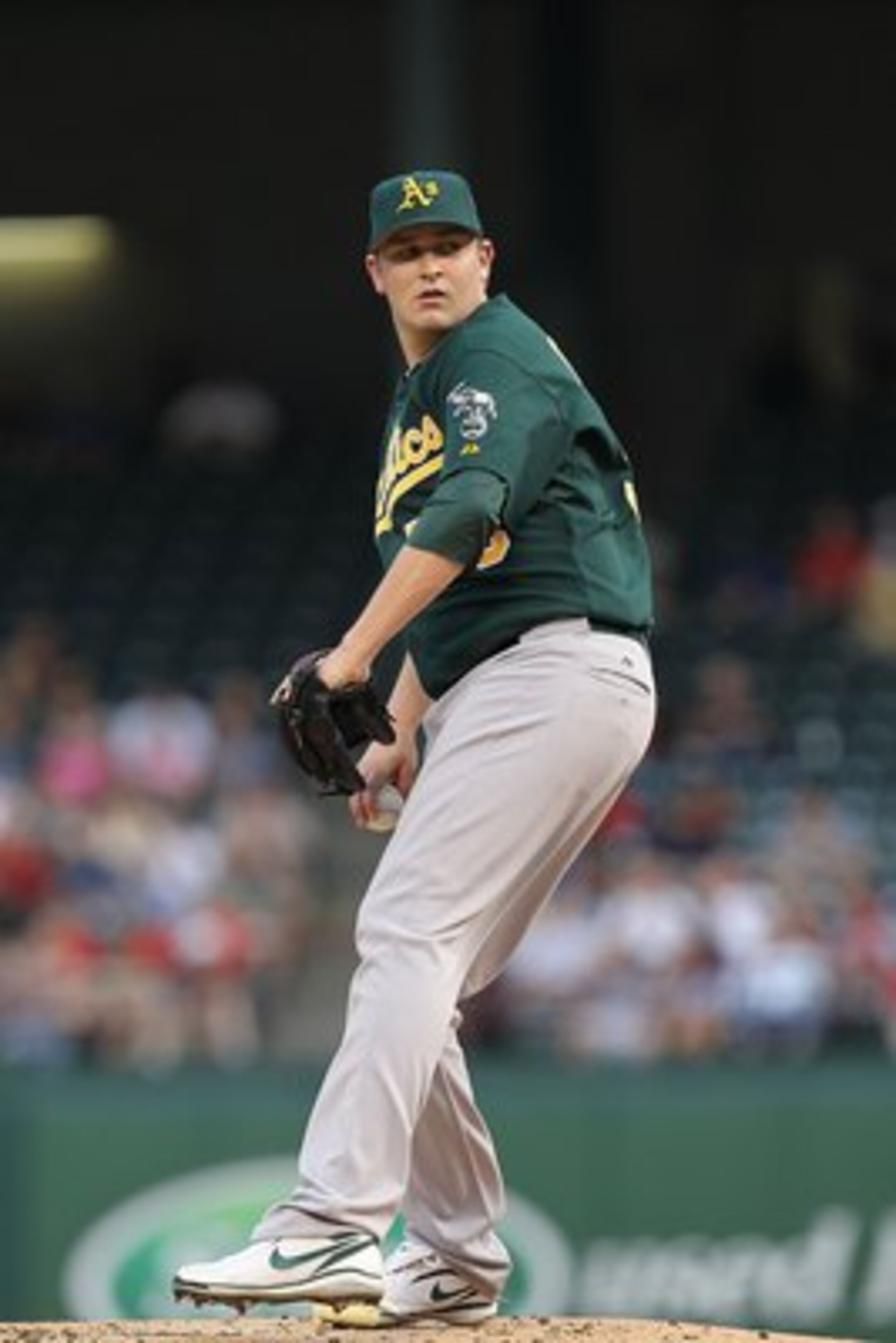 ARLINGTON, TX - MAY 11:  Pitcher Trevor Cahill #53 of the Oakland Athletics throws against the Texas Rangers on May 11, 2010 at Rangers Ballpark in Arlington, Texas.  (Photo by Ronald Martinez/Getty Images)