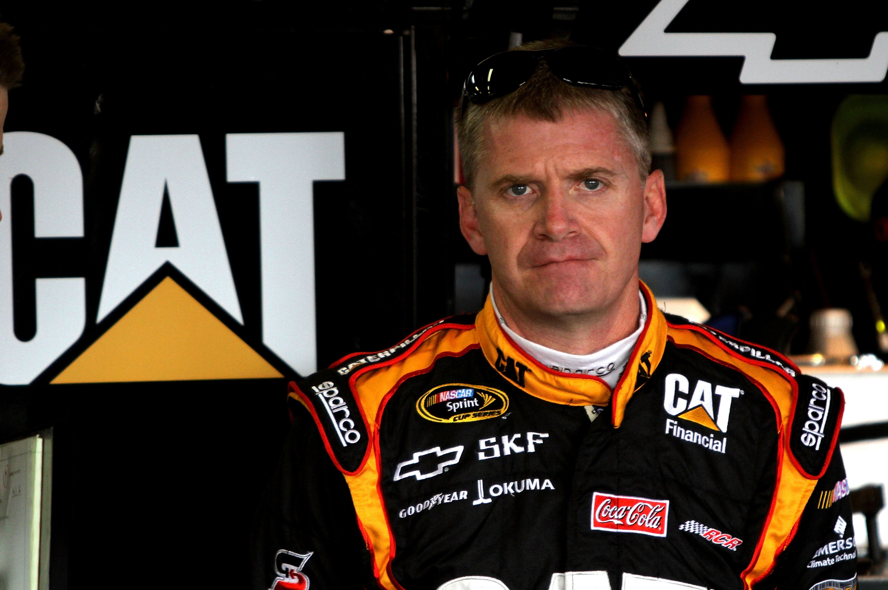TALLADEGA, AL - APRIL 15: Jeff Burton, driver of the #31 CAT Chevrolet, stands in the garage during practice for the NASCAR Sprint Cup Series Aaron's 499 at Talladega Superspeedway on April 15, 2011 in Talladega, Alabama.  (Photo by Jerry Markland/Getty I