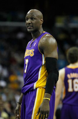 NEW ORLEANS, LA - APRIL 24:  Lamar Odom #7 of the Los Angeles Lakers stands during a freethrow against the New Orleans Hornets in Game Four of the Western Conference Quarterfinals in the 2011 NBA Playoffs at New Orleans Arena on April 24, 2011 in New Orle