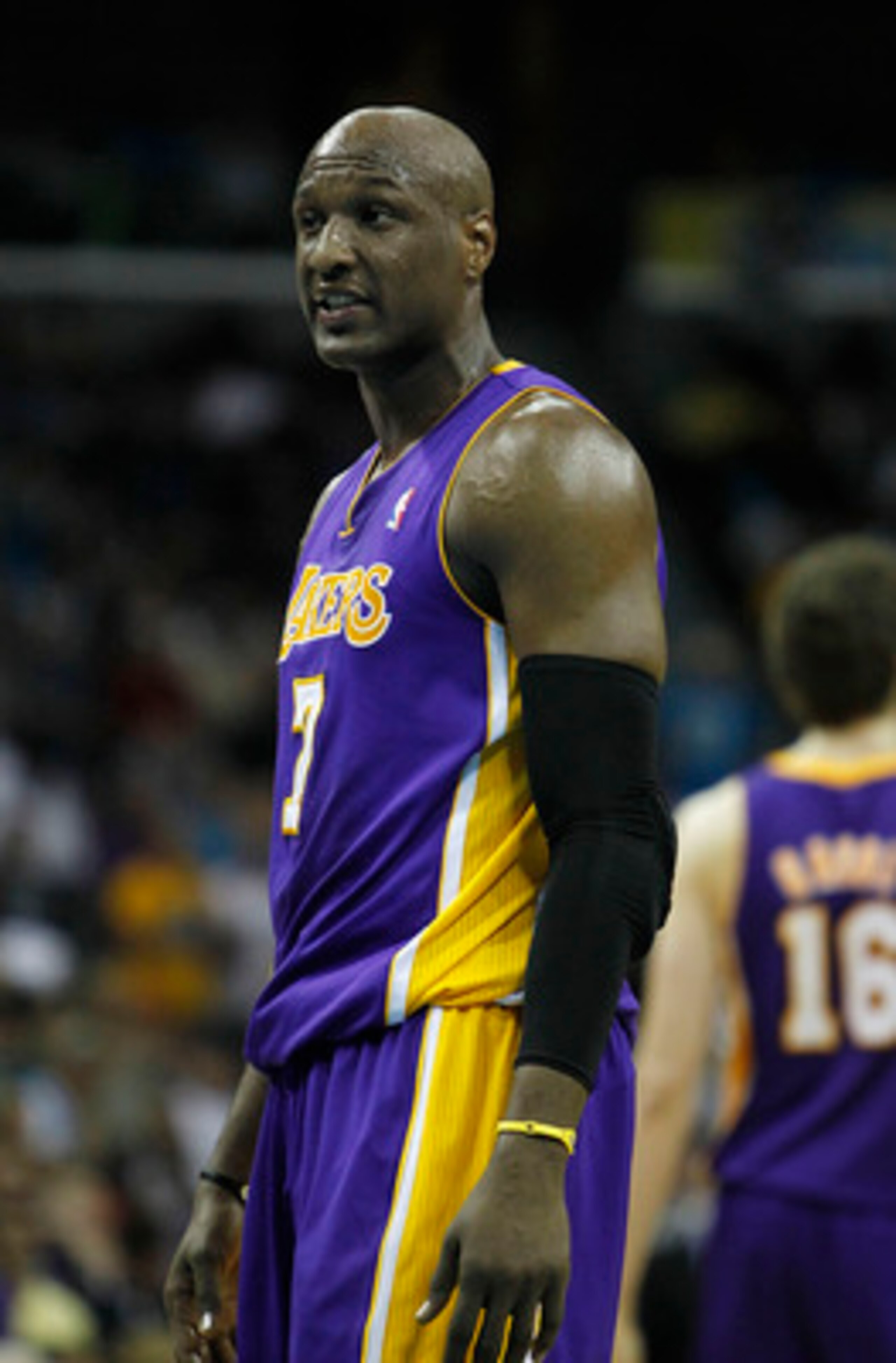 NEW ORLEANS, LA - APRIL 24:  Lamar Odom #7 of the Los Angeles Lakers stands during a freethrow against the New Orleans Hornets in Game Four of the Western Conference Quarterfinals in the 2011 NBA Playoffs at New Orleans Arena on April 24, 2011 in New Orle