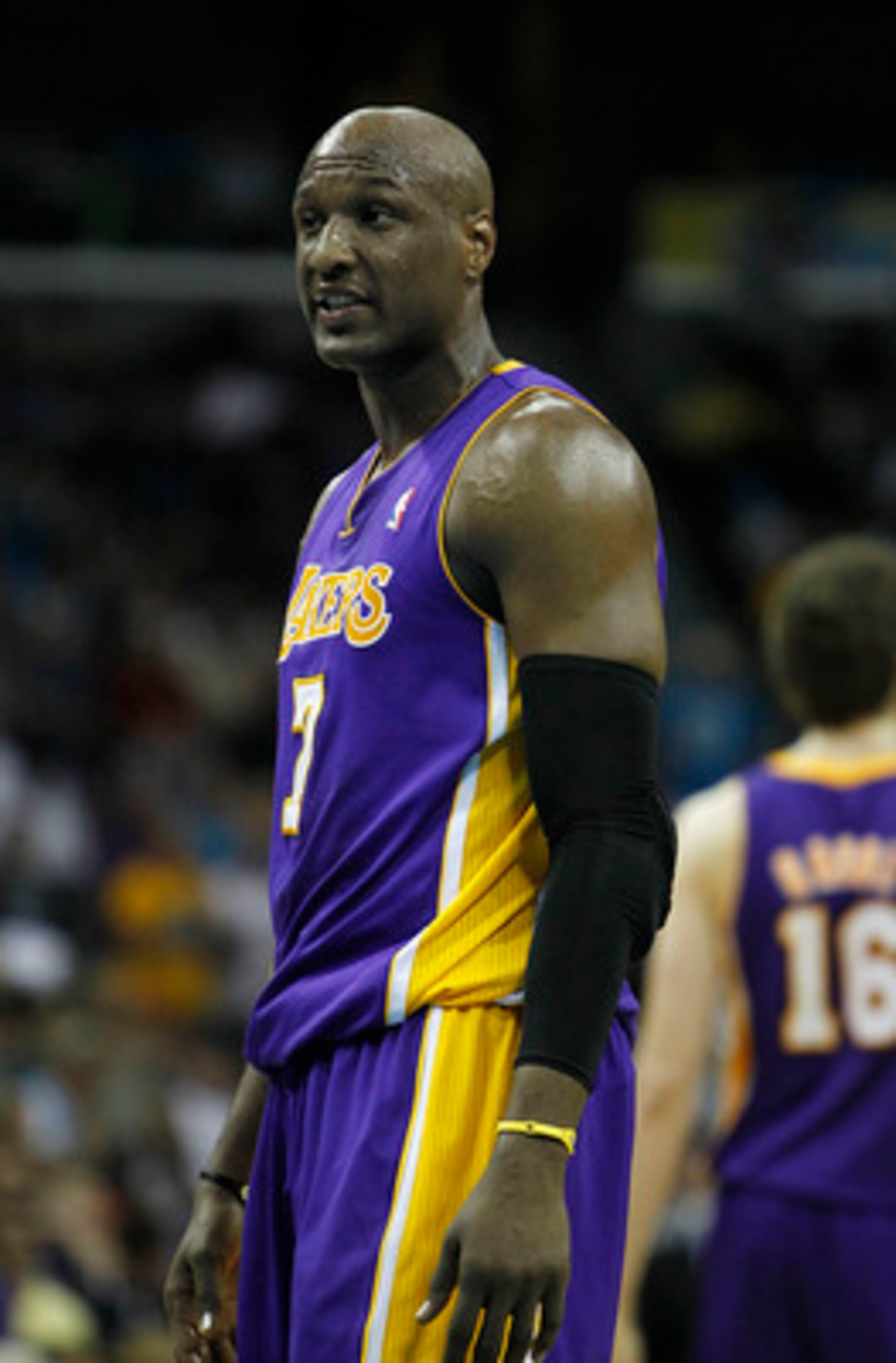 NEW ORLEANS, LA - APRIL 24:  Lamar Odom #7 of the Los Angeles Lakers stands during a freethrow against the New Orleans Hornets in Game Four of the Western Conference Quarterfinals in the 2011 NBA Playoffs at New Orleans Arena on April 24, 2011 in New Orle